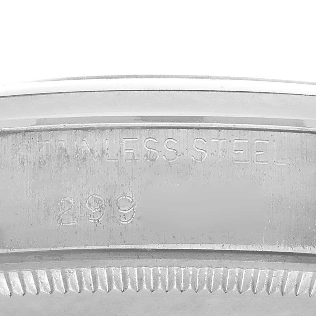 The image shows a close-up of the side engraving on a stainless steel Rolex Air-King 5500 Men's Stainless Steel Silver Dial 5500 Men's Stainless Steel Silver Dial watch, highlighting the details.