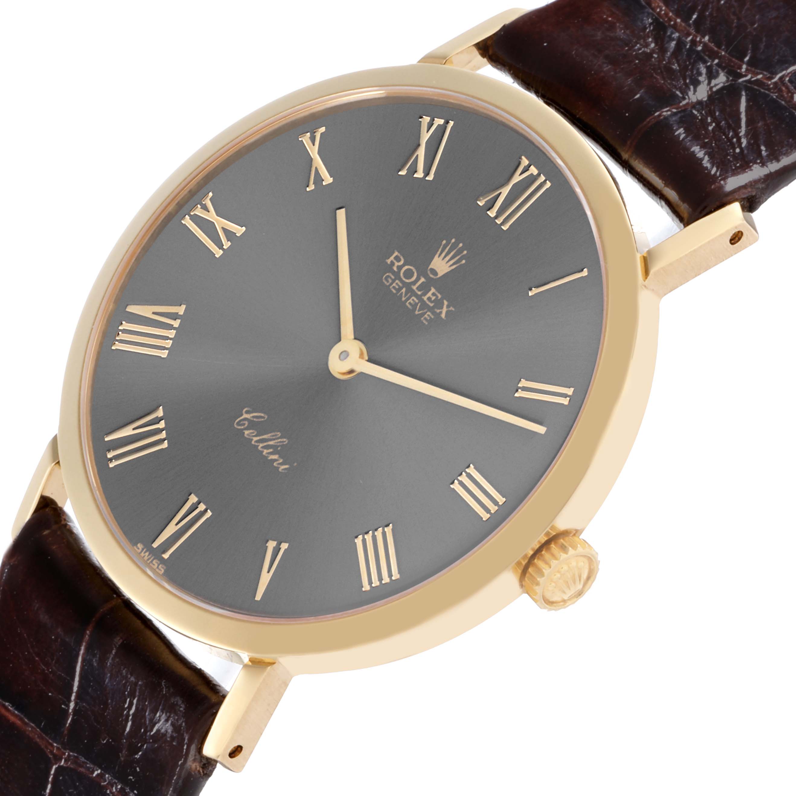 The Rolex Cellini 4112 Men's Yellow Gold Grey Dial 4112 Men's Yellow Gold Grey Dial watch is shown at an oblique angle, displaying the face, Roman numerals, crown, and part of the leather strap.