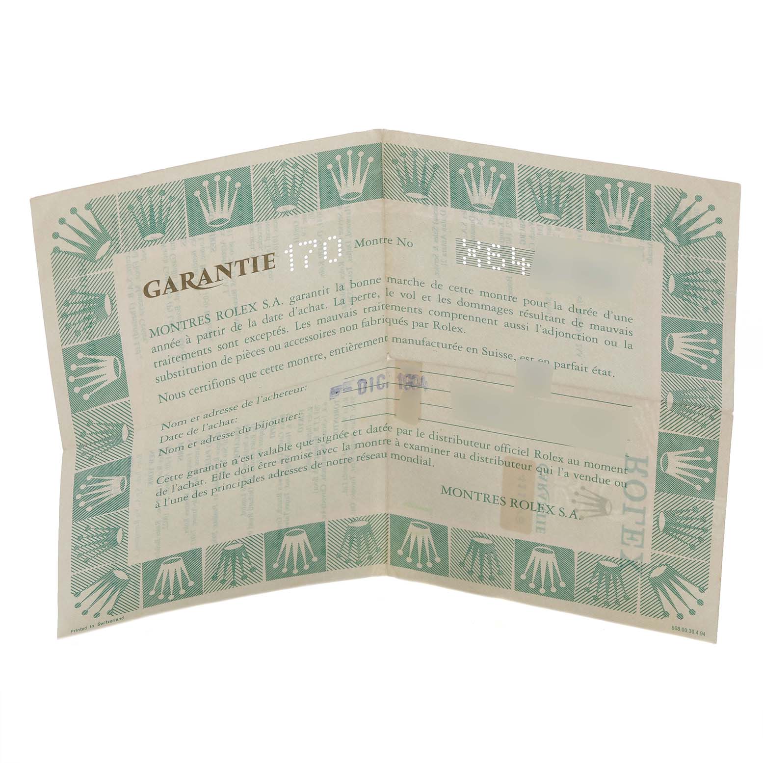 The image shows a Rolex Cellini 4112 Men's Yellow Gold Grey Dial 4112 Men's Yellow Gold Grey Dial model warranty paper laid flat, featuring text and the Rolex crown logo.