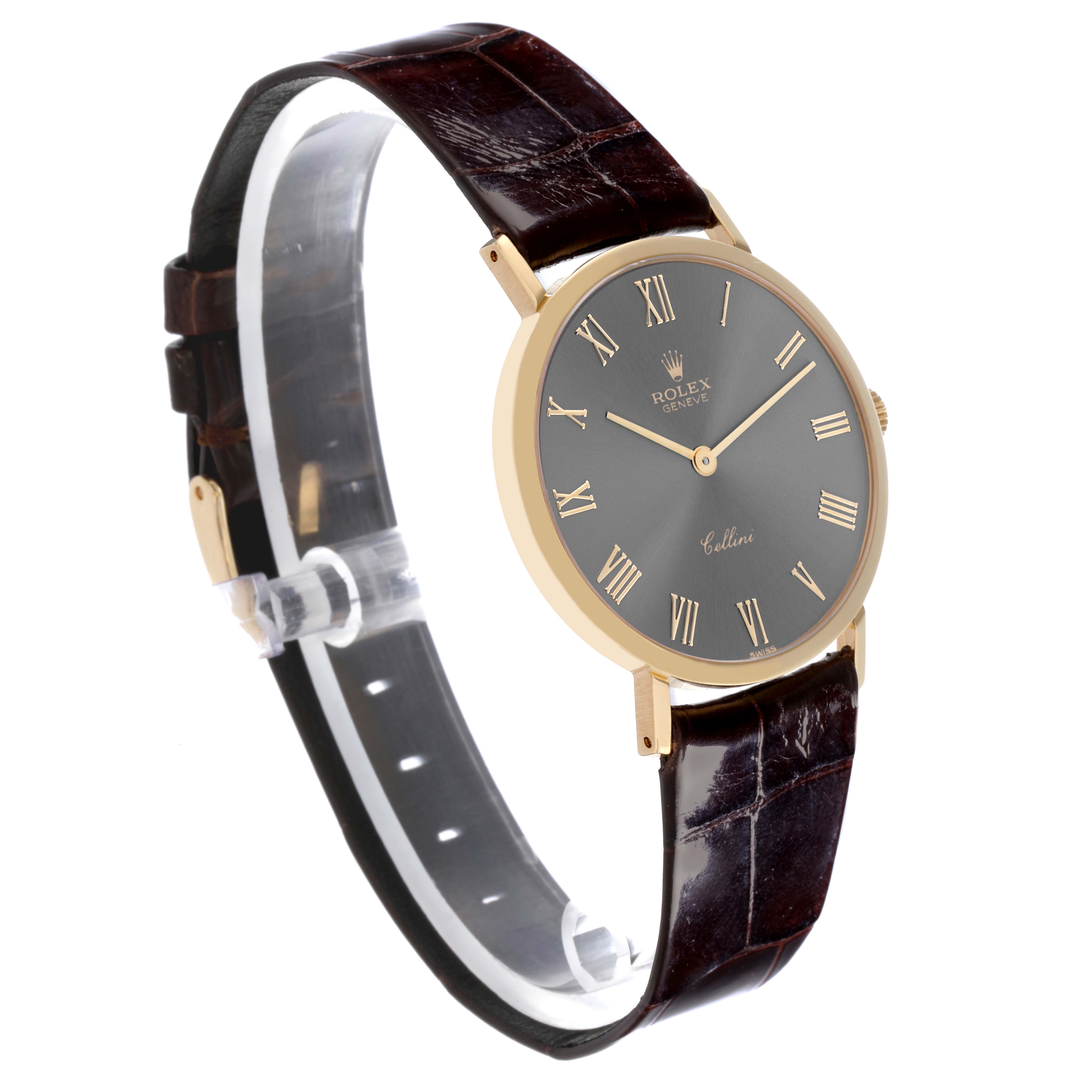 The Rolex Cellini 4112 Men's Yellow Gold Grey Dial 4112 Men's Yellow Gold Grey Dial watch is shown at a three-quarter angle, highlighting its dial, case, lugs, and leather strap.