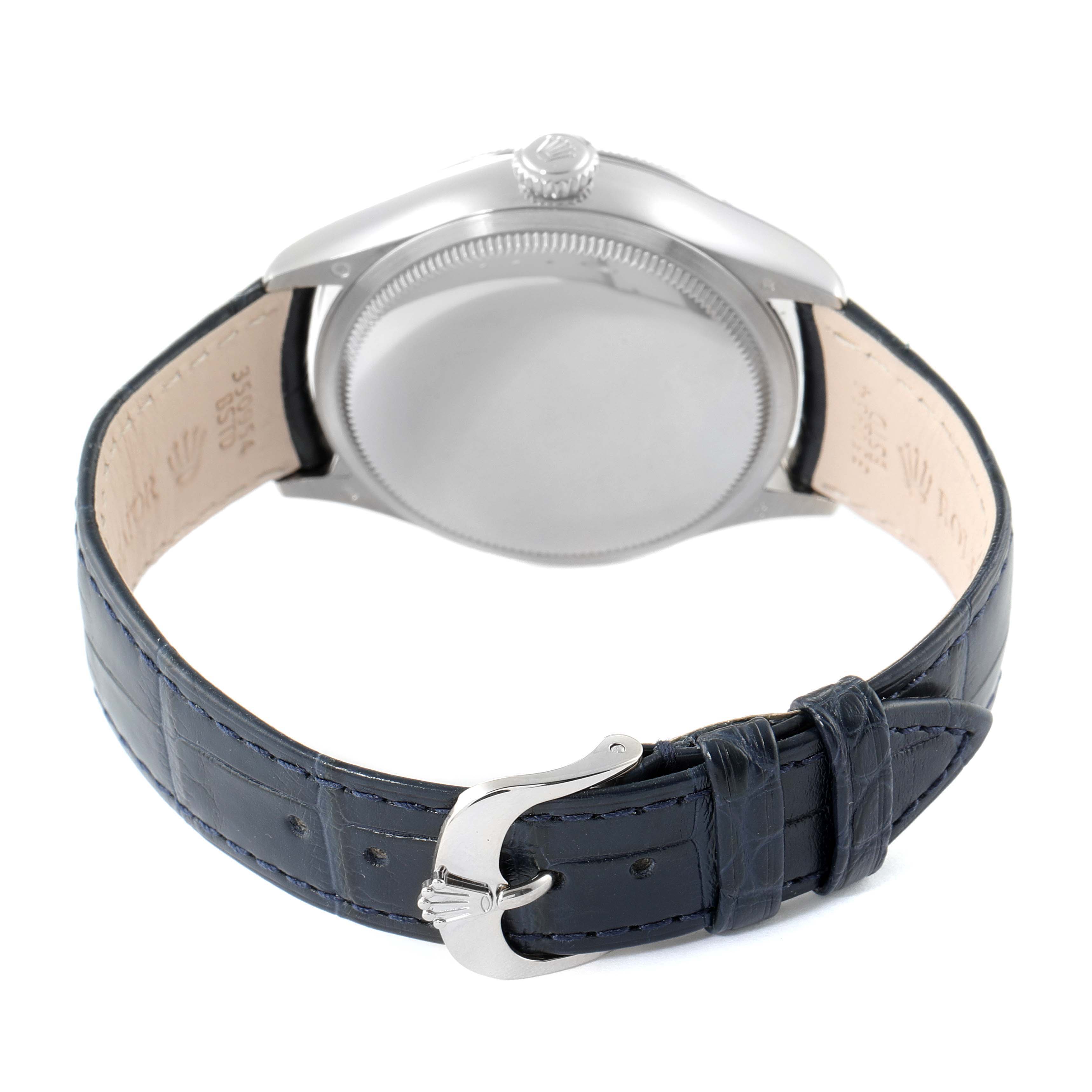 The image shows the back and strap of a Rolex Cellini 50519 Men
s White Gold Blue Dial 50519 Men
s White Gold Blue Dial watch, including the crown and buckle, viewed from the rear side.