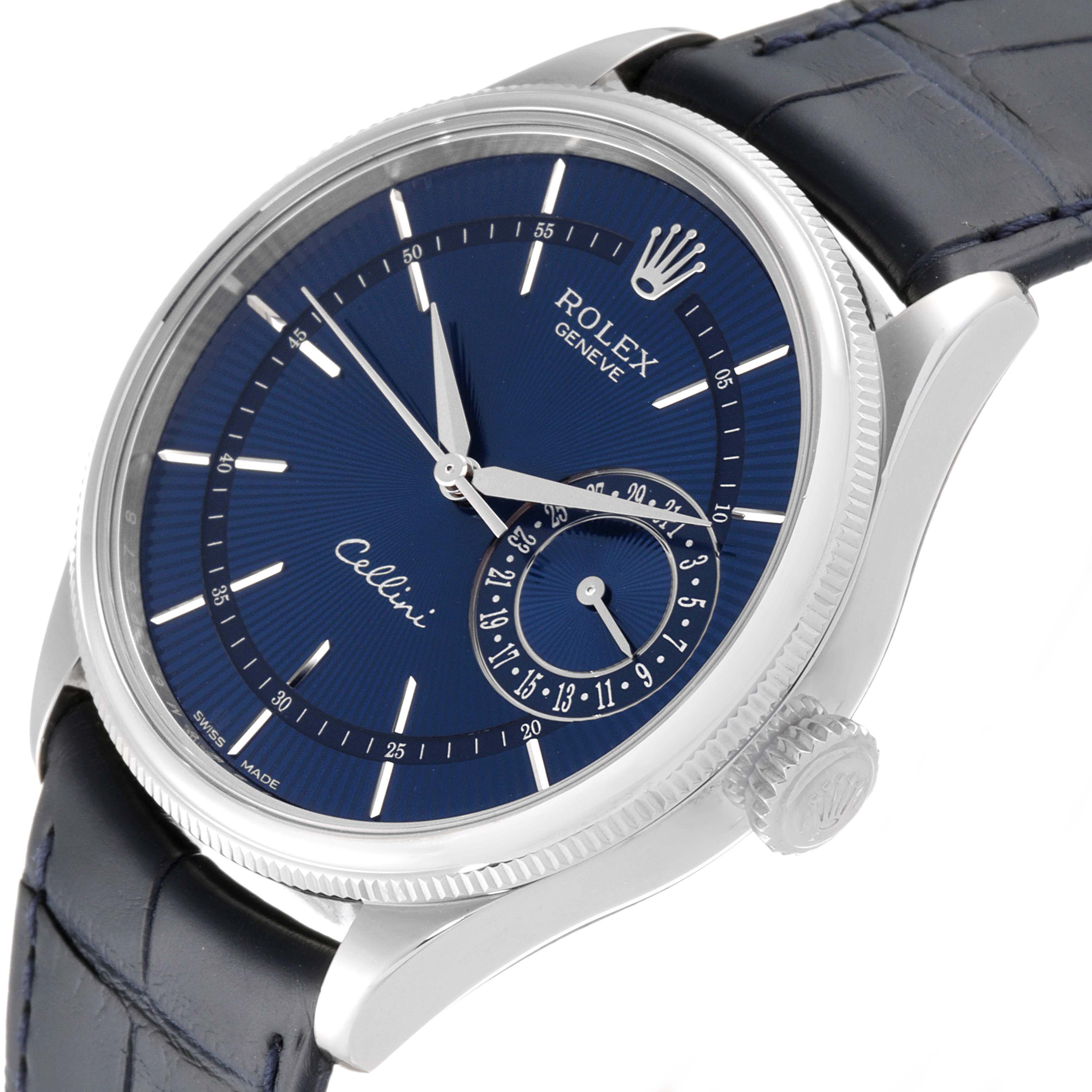 The Rolex Cellini 50519 Men
s White Gold Blue Dial 50519 Men
s White Gold Blue Dial watch is shown at a slight angle, displaying the blue dial, silver markers, and leather strap.