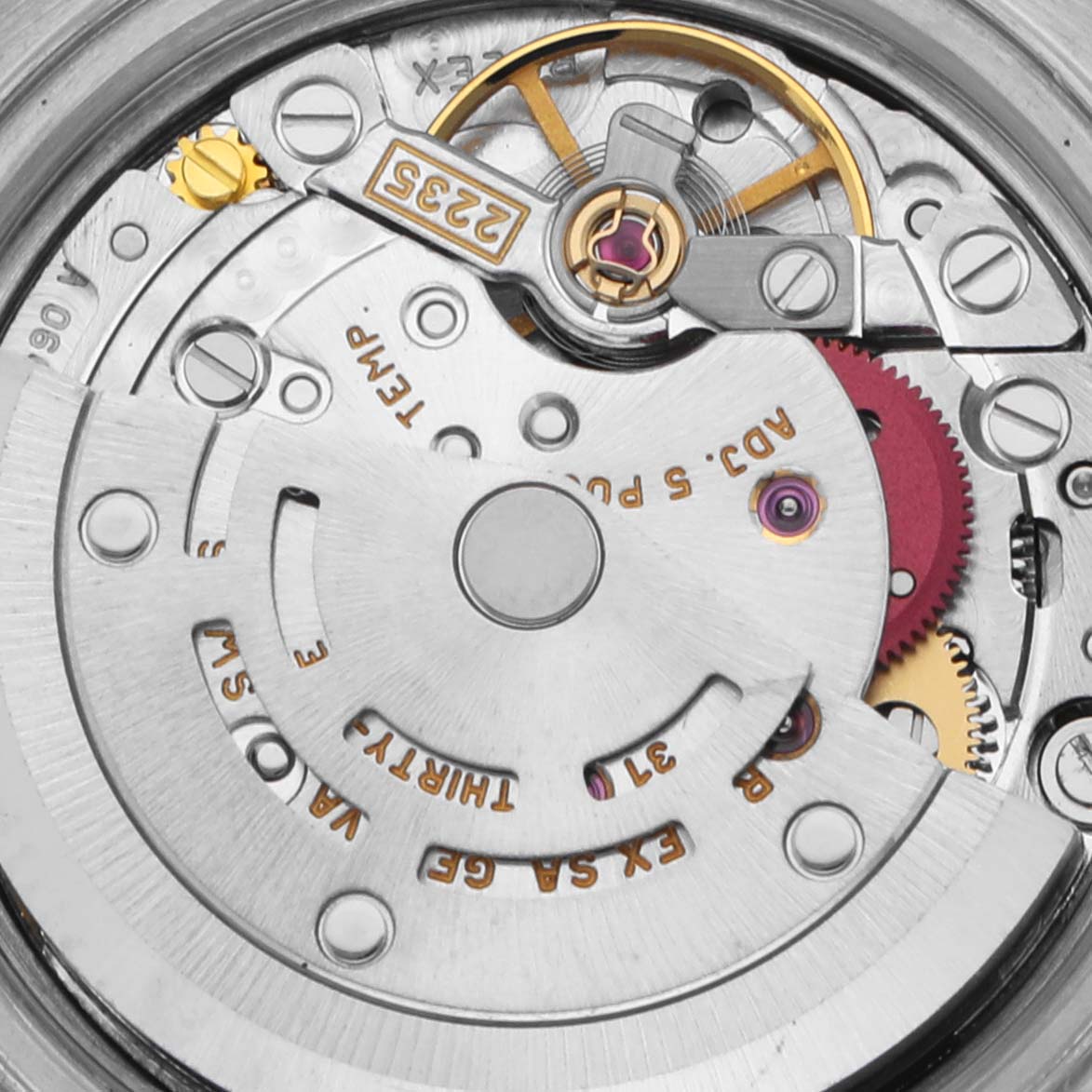The image shows a close-up of the movement of a Rolex Date 79240 Women's Stainless Steel Blue Dial 79240 Women's Stainless Steel Blue Dial model, highlighting the rotor and gear components.