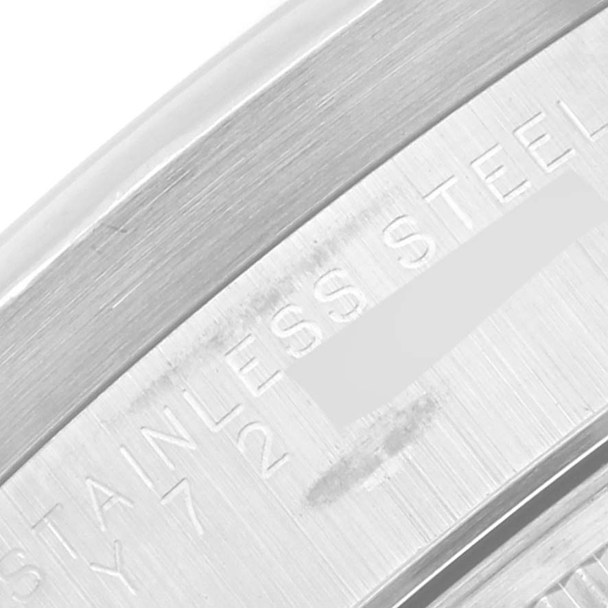 This is a close-up of the engraving on the stainless steel case back of a Rolex Date 15210 Men
s Stainless Steel Silver Dial 15210 Men
s Stainless Steel Silver Dial model watch.