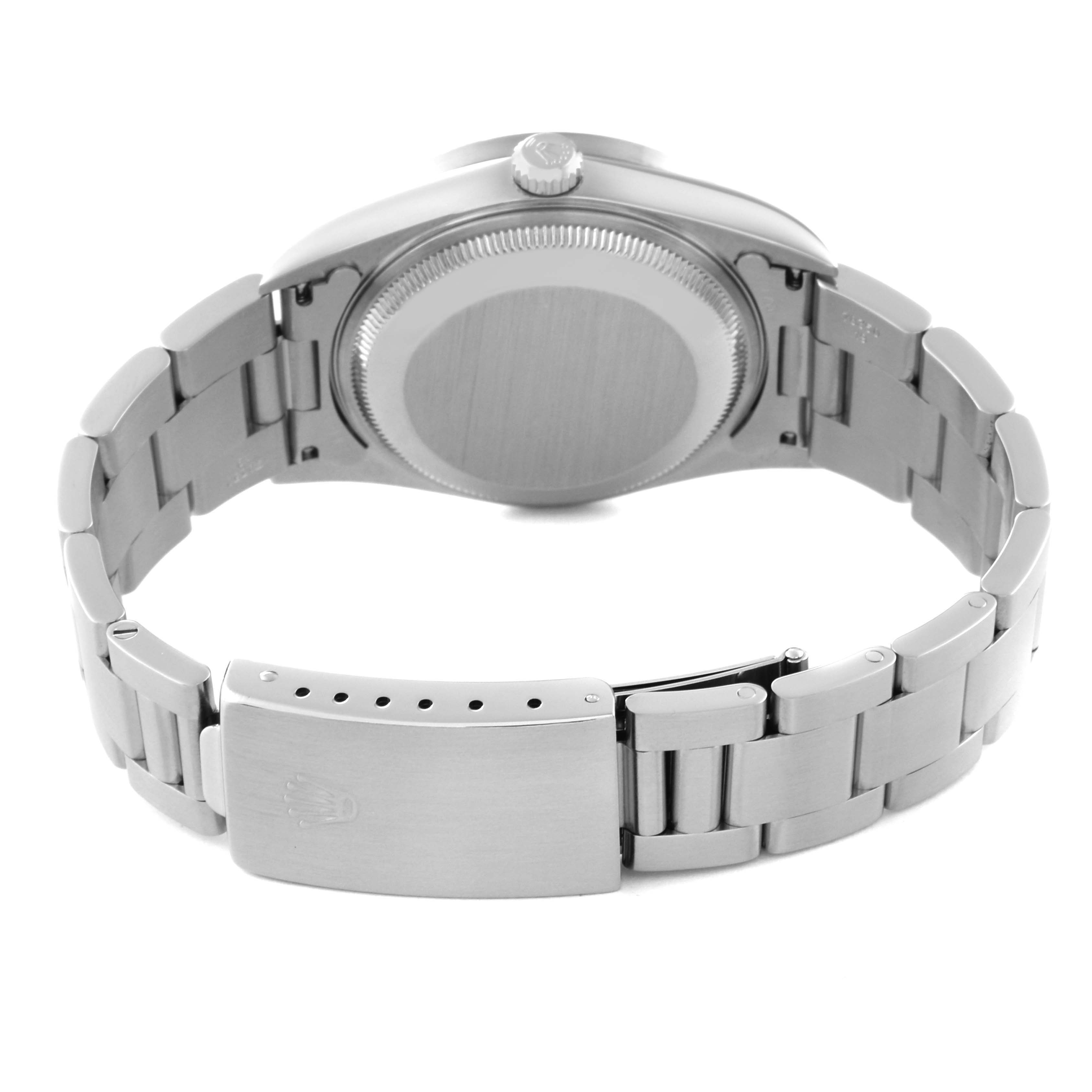 This image shows the back and bracelet of the Rolex Date 15210 Men
s Stainless Steel Silver Dial 15210 Men
s Stainless Steel Silver Dial model watch from a rear angle.