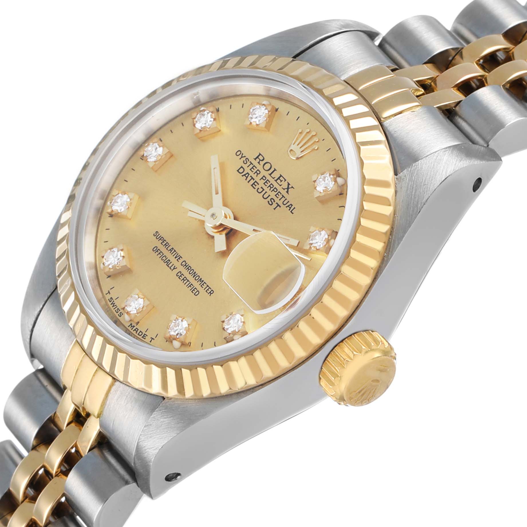The Rolex Datejust 69173 Women's Steel and Gold (two tone) Champagne Dial watch is shown from a low side angle, displaying the bezel, crown, dial, and part of the bracelet.
