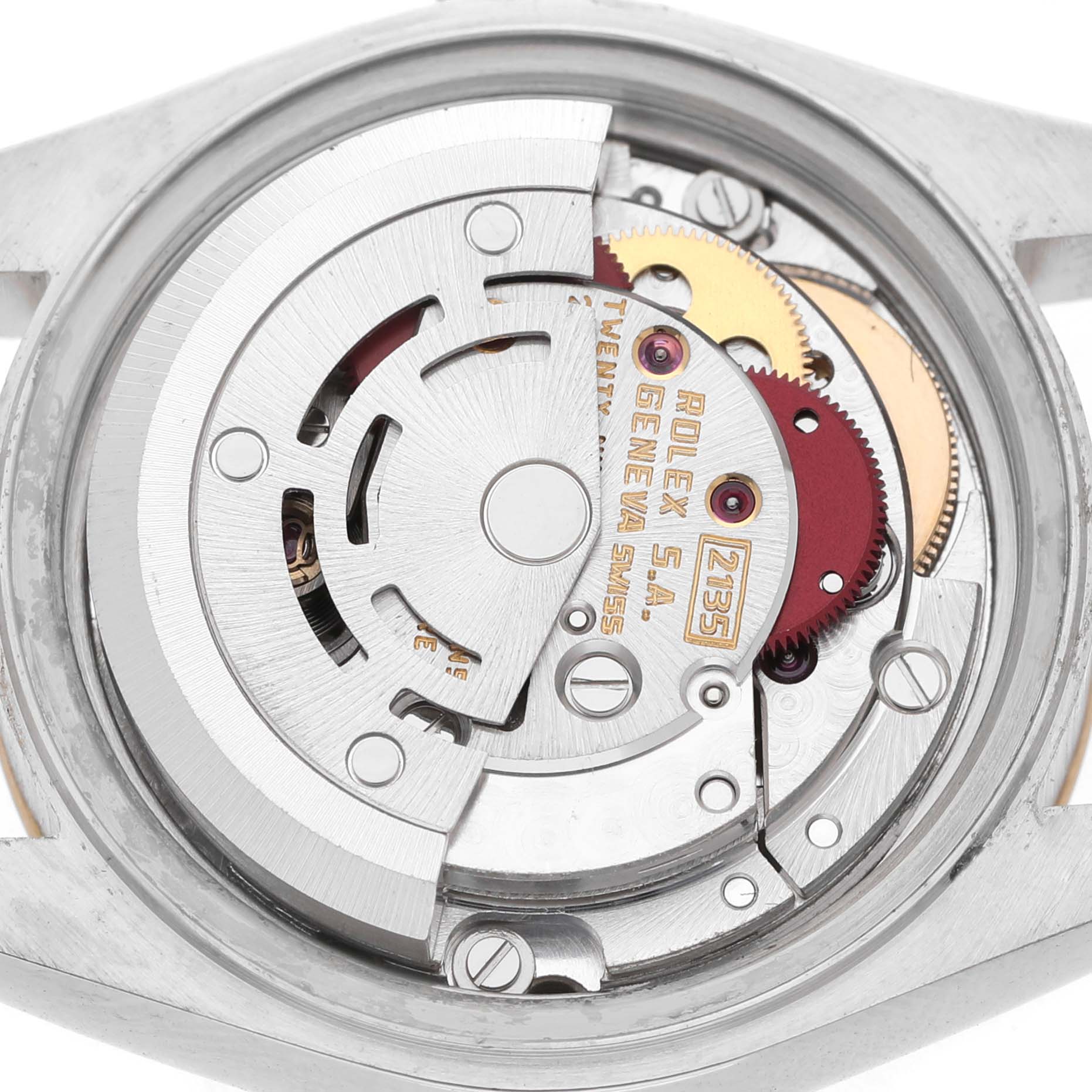 This image shows the movement of a Rolex Datejust 69173 Women's Steel and Gold (two tone) Champagne Dial watch from the back, highlighting its internal mechanics.