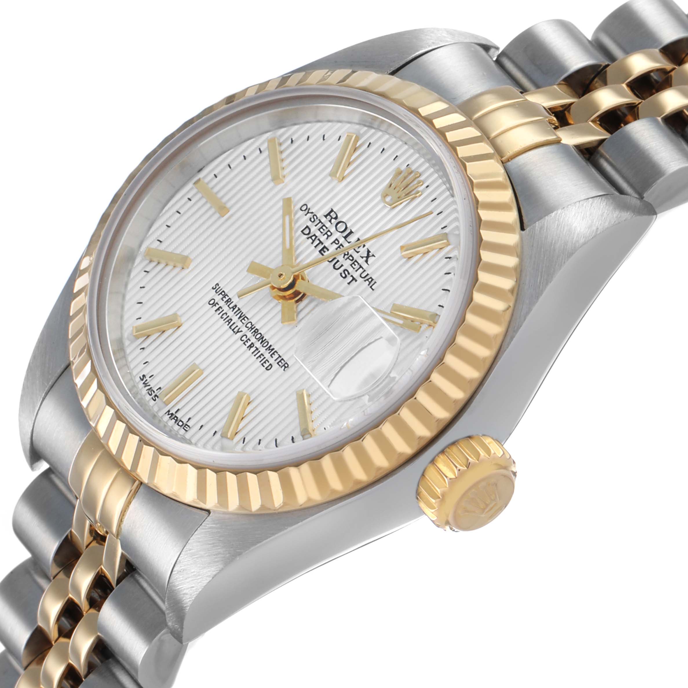 The Rolex Datejust 79173 Women's Steel and Gold (two tone) Silver Dial is shown at an angle highlighting the dial, bezel, crown, and part of the bracelet.