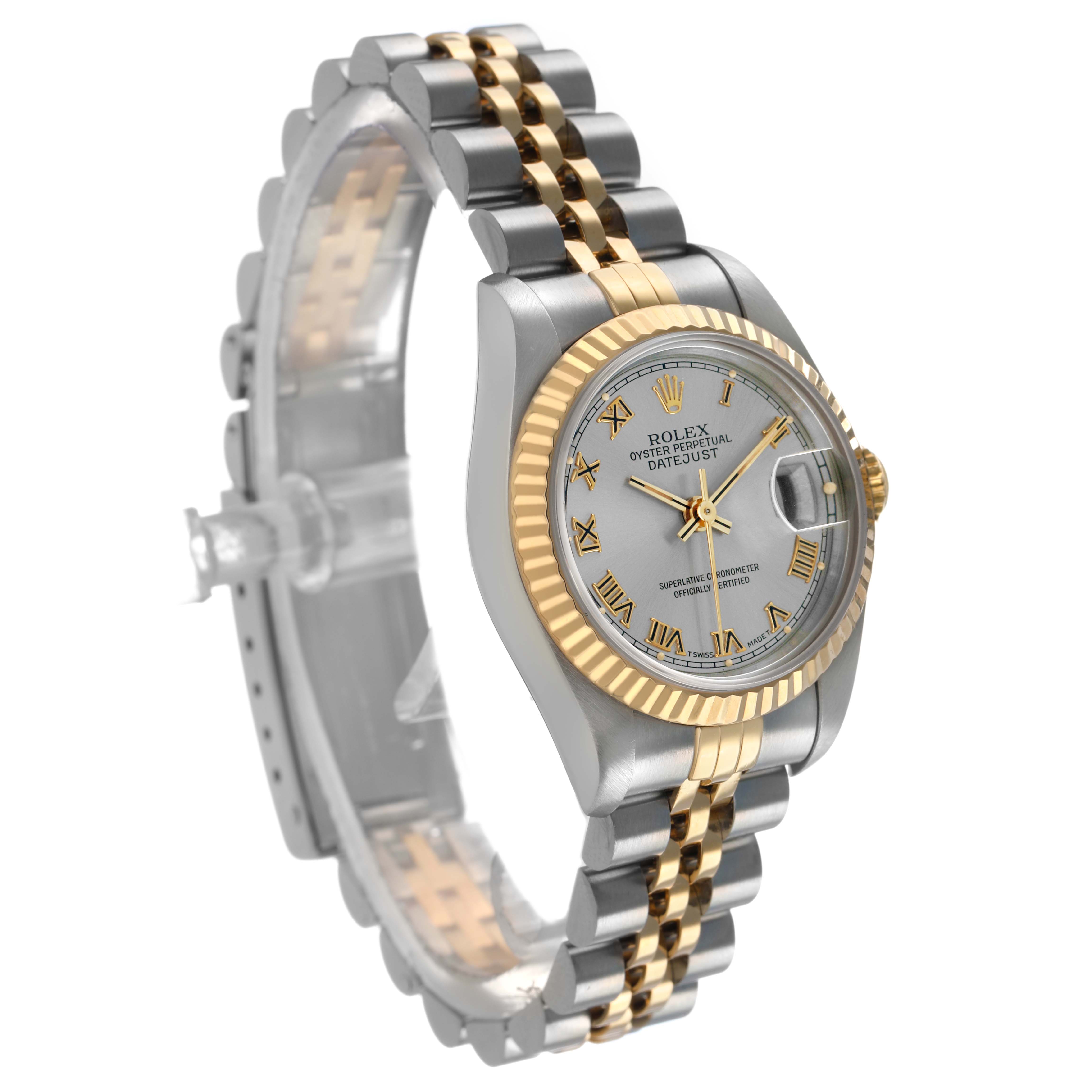 The Rolex Datejust 69173 Women's Steel and Gold (two tone) Silver Dial watch is shown at a three-quarter angle, displaying the face, fluted bezel, two-tone bracelet, and side profile.