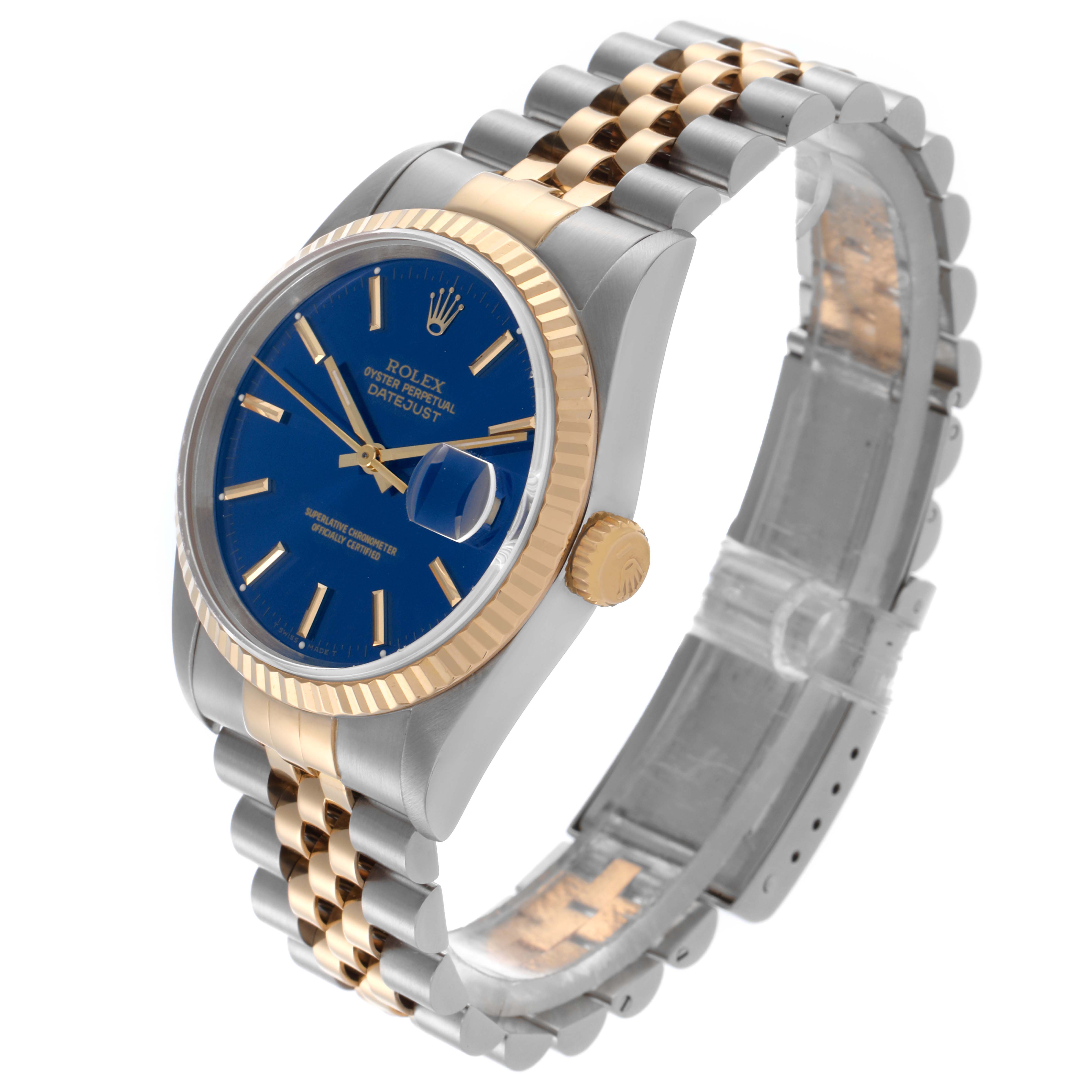 The Rolex Datejust 16233 Men's Steel and Gold (two tone) Blue Dial 16233 Men's Steel and Gold (two tone) Blue Dial watch is shown at a three-quarter angle, highlighting the blue dial, fluted bezel, and two-tone bracelet.