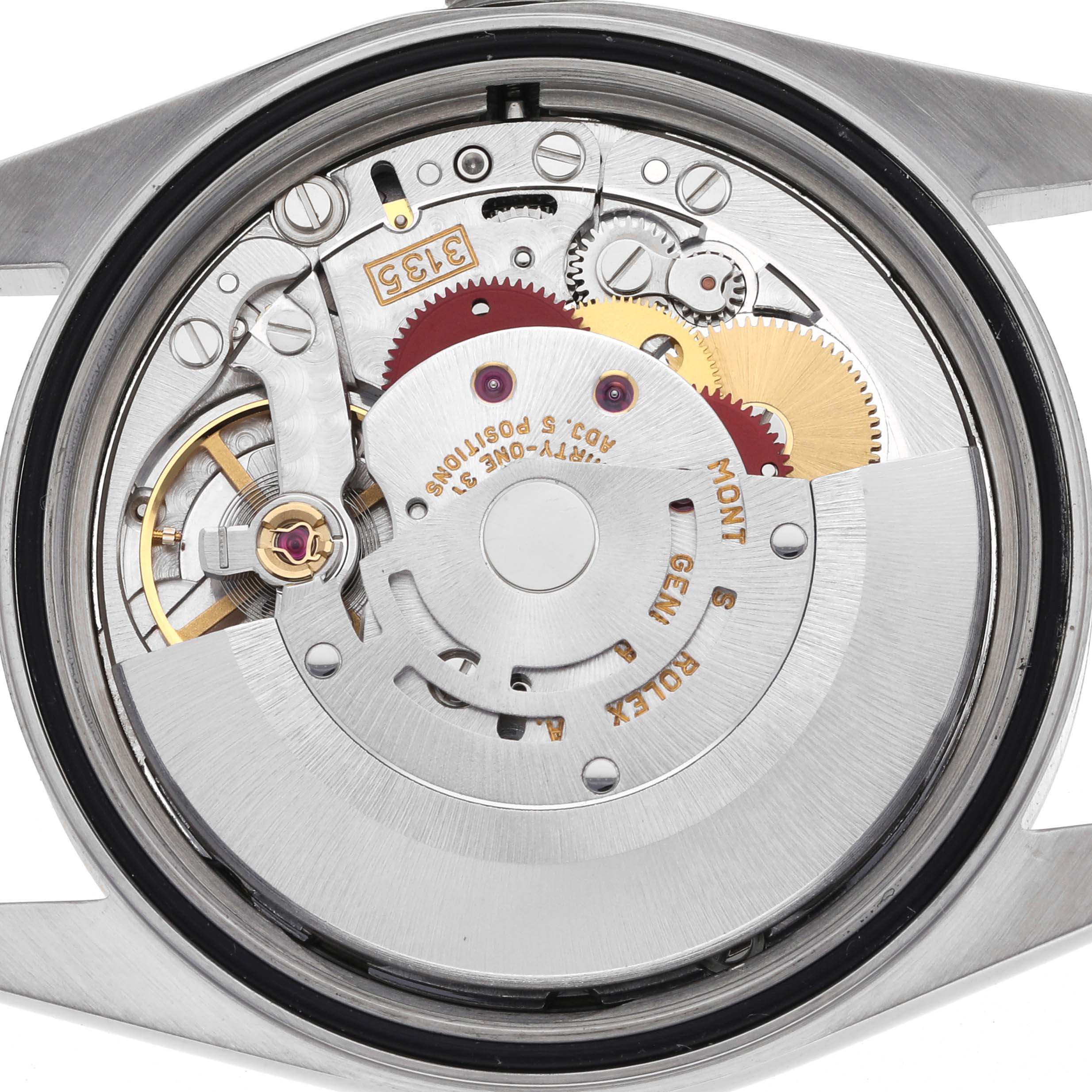 The image shows the movement of a Rolex Datejust 16203 Men's Steel and Gold (two tone) Champagne Dial 16203 Men's Steel and Gold (two tone) Champagne Dial from the back, highlighting gears and internal components.