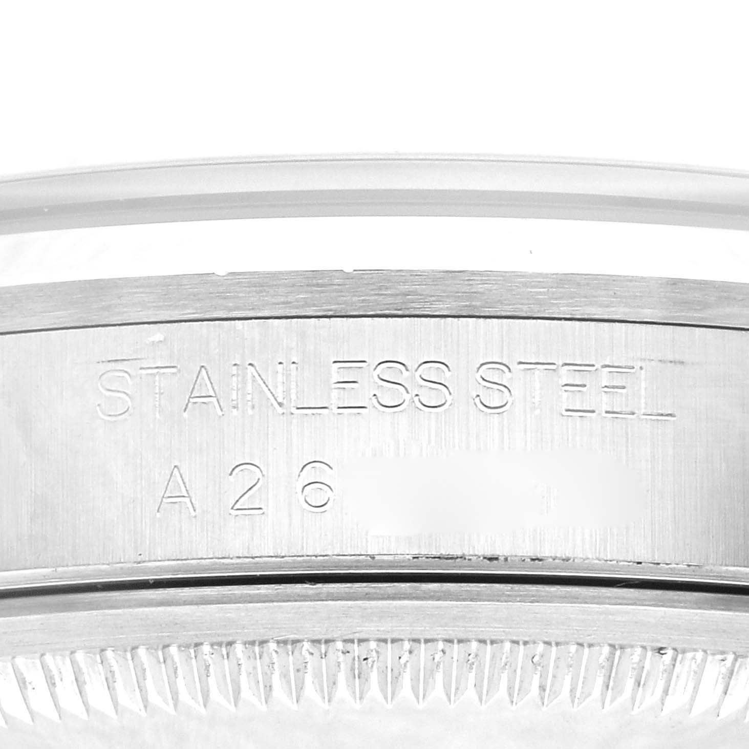 This image shows a close-up of the side of the stainless steel case of a Rolex Datejust 16200 Men's Stainless Steel Black Dial 16200 Men's Stainless Steel Black Dial watch.
