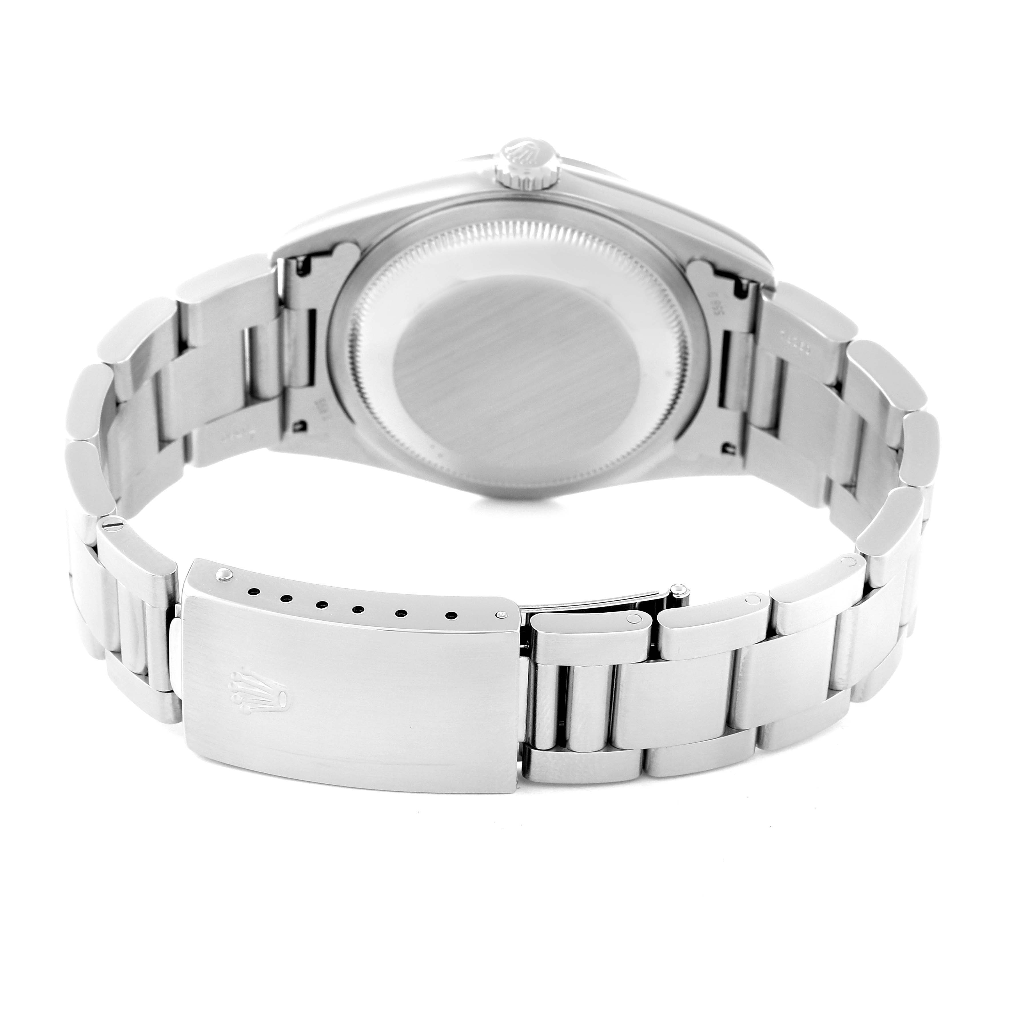 This image displays the back view of a Rolex Datejust 16200 Men's Stainless Steel Black Dial 16200 Men's Stainless Steel Black Dial watch, highlighting its closed case back and metal bracelet with clasp.