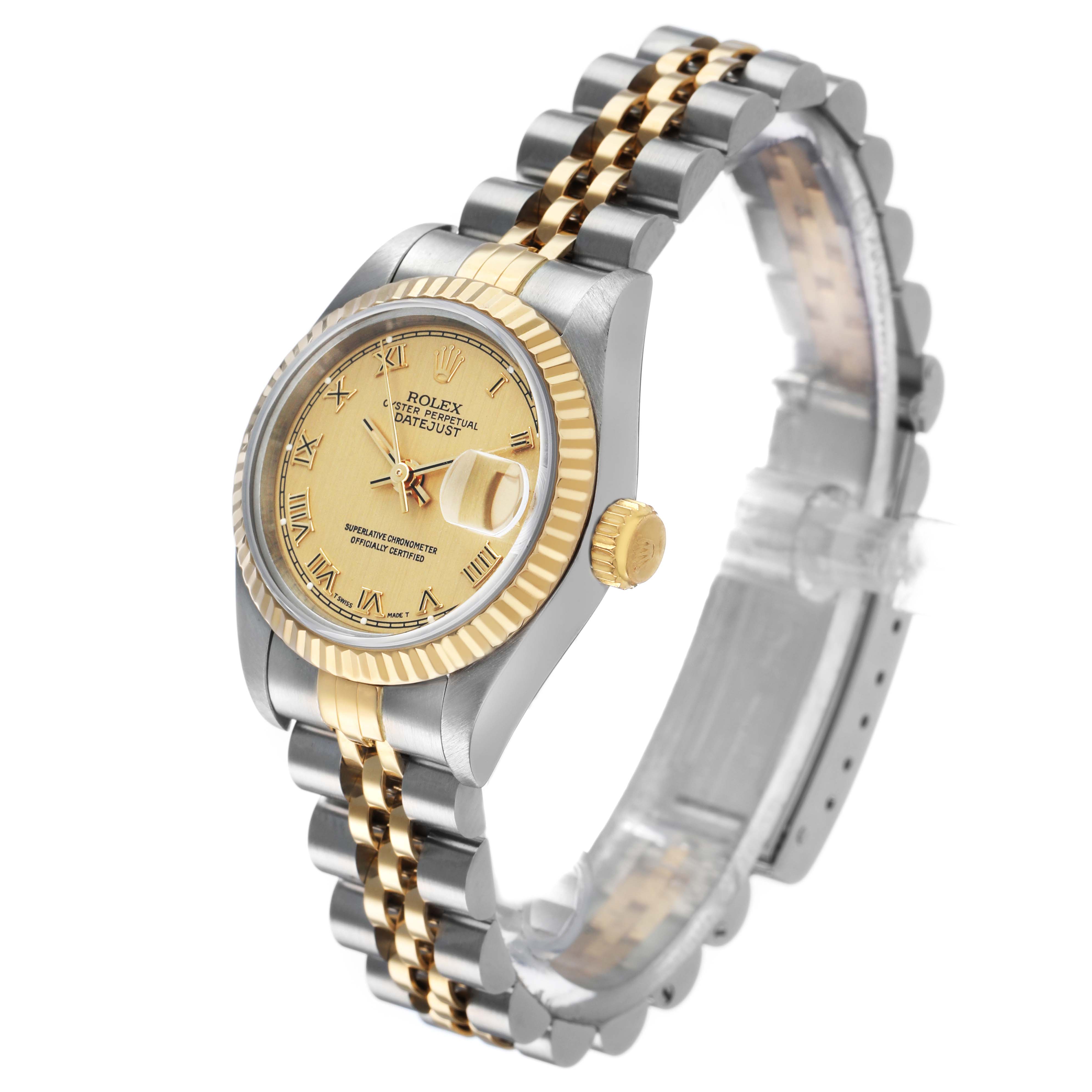 The Rolex Datejust 69173 Women's Steel and Gold (two tone) Champagne Dial watch is shown at an angle highlighting its gold and silver bracelet, bezel, crown, and face with Roman numerals.