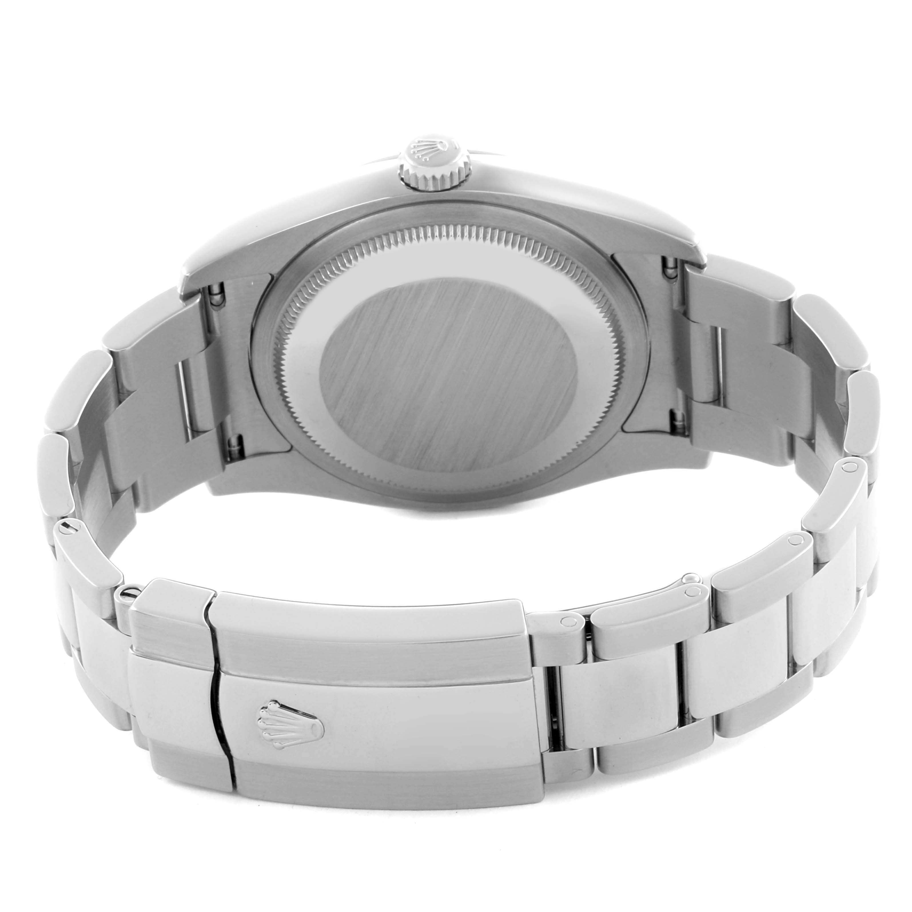 The image shows the back view of a Rolex Datejust 116200 Men's Stainless Steel Silver Dial 116200 Men's Stainless Steel Silver Dial, highlighting its case back, crown, and bracelet clasp.
