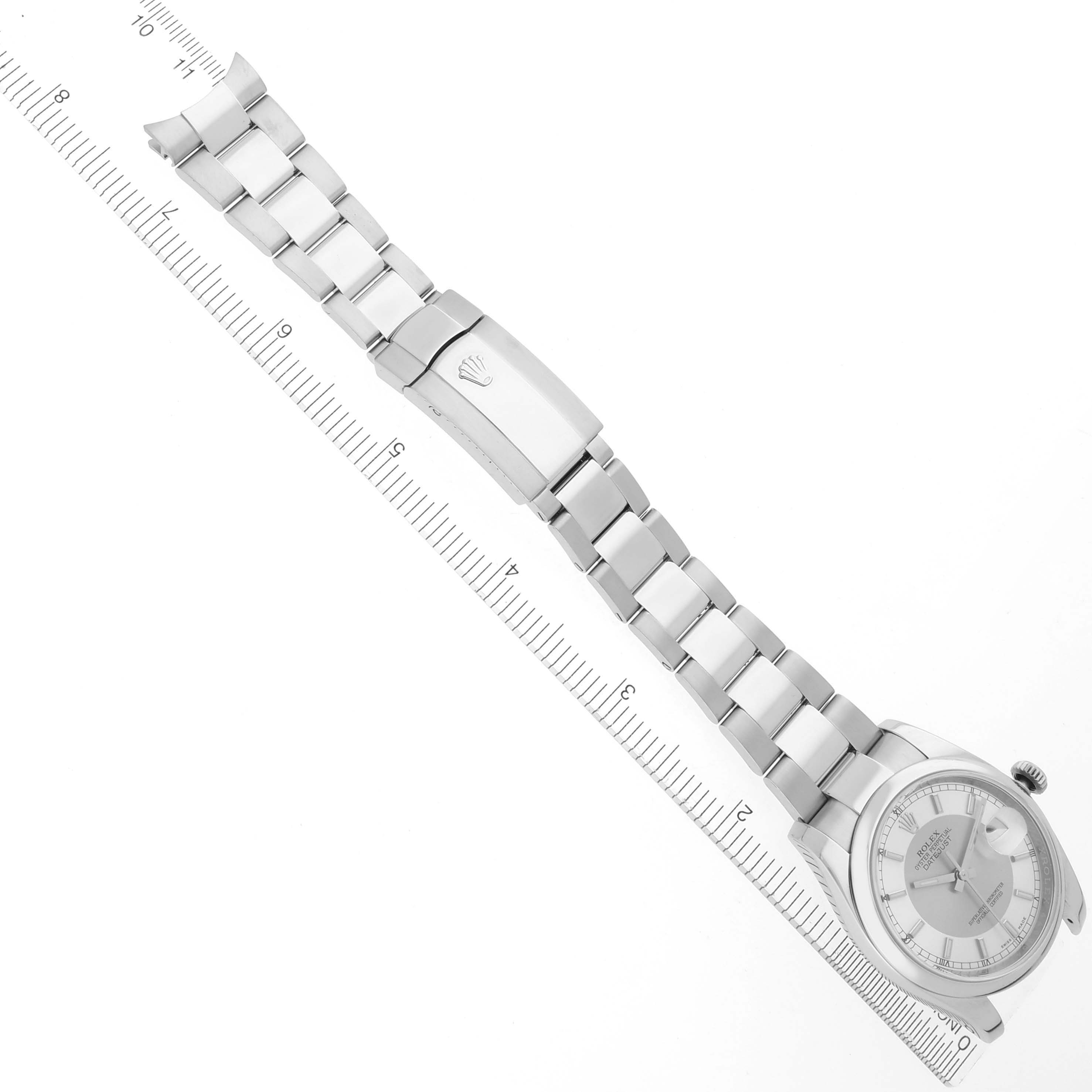 The Rolex Datejust 116200 Men's Stainless Steel Silver Dial 116200 Men's Stainless Steel Silver Dial watch is shown from a top view, displaying the full bracelet, clasp, case, and dial.