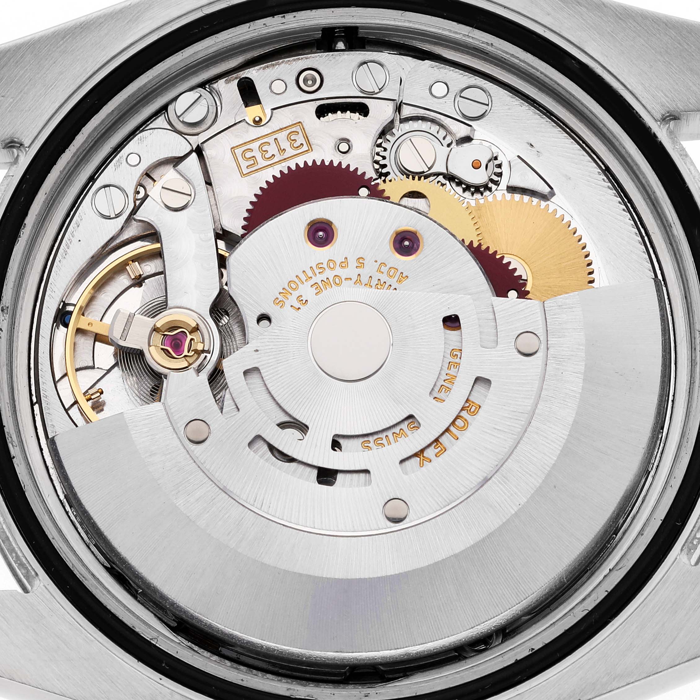 This close-up view shows the intricate inner mechanism of the Rolex Datejust 116231G Men's Steel and Gold (two tone) Pink Dial 116231G Men's Steel and Gold (two tone) Pink Dial watch movement.