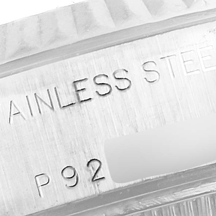 This image shows a close-up of the case back edge of a Rolex Datejust 79174 Women's Stainless Steel Silver Dial 79174 Women's Stainless Steel Silver Dial watch made of stainless steel.