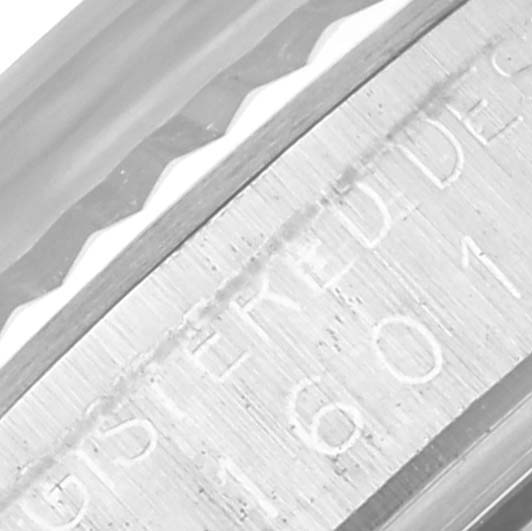 The image shows a close-up of the rehaut with engravings on a Rolex Datejust 1601 Men's Stainless Steel Grey Dial 1601 Men's Stainless Steel Grey Dial watch.