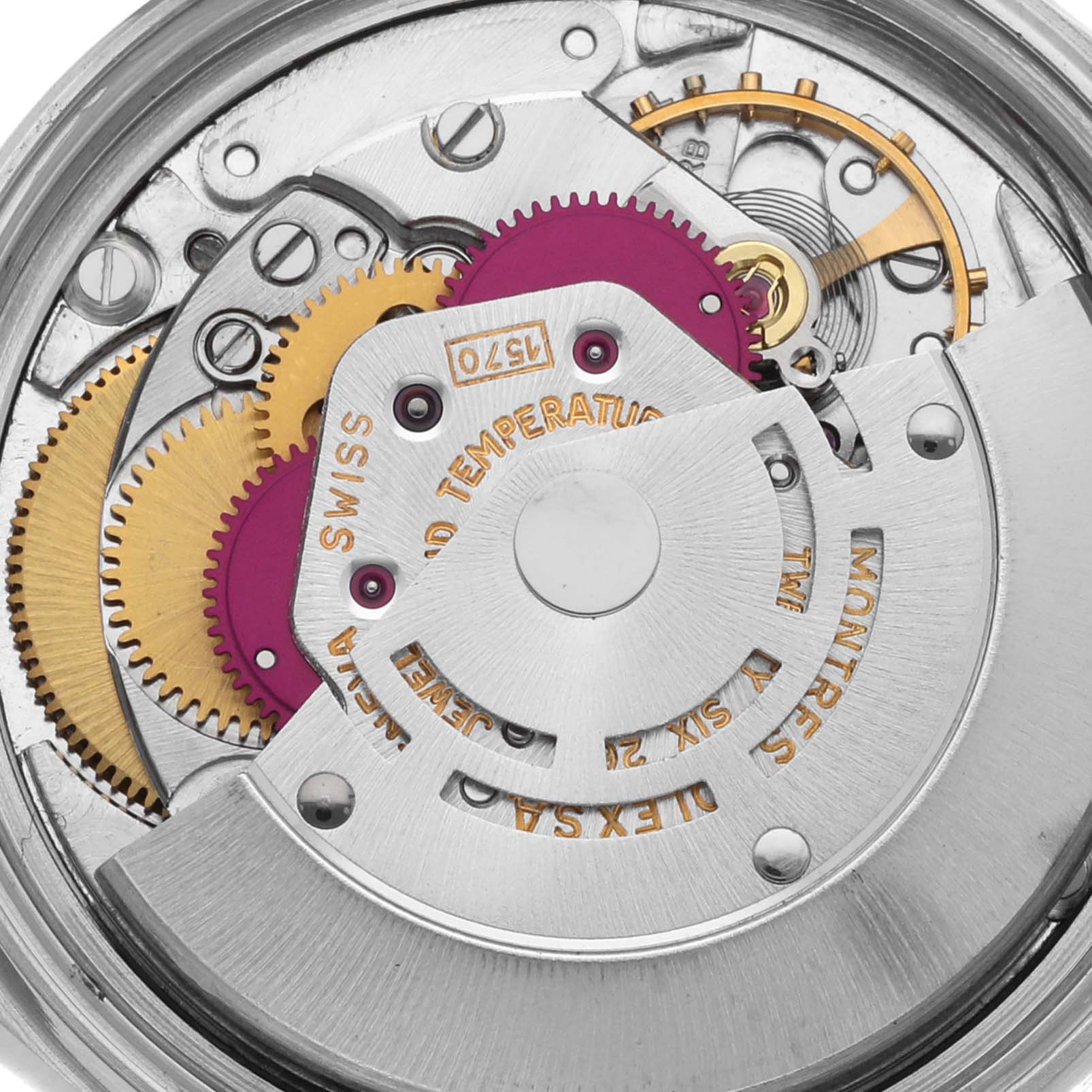 The image shows a close-up of the movement inside a Rolex Datejust 1601 Men's Stainless Steel Grey Dial 1601 Men's Stainless Steel Grey Dial, featuring gears and a rotor.