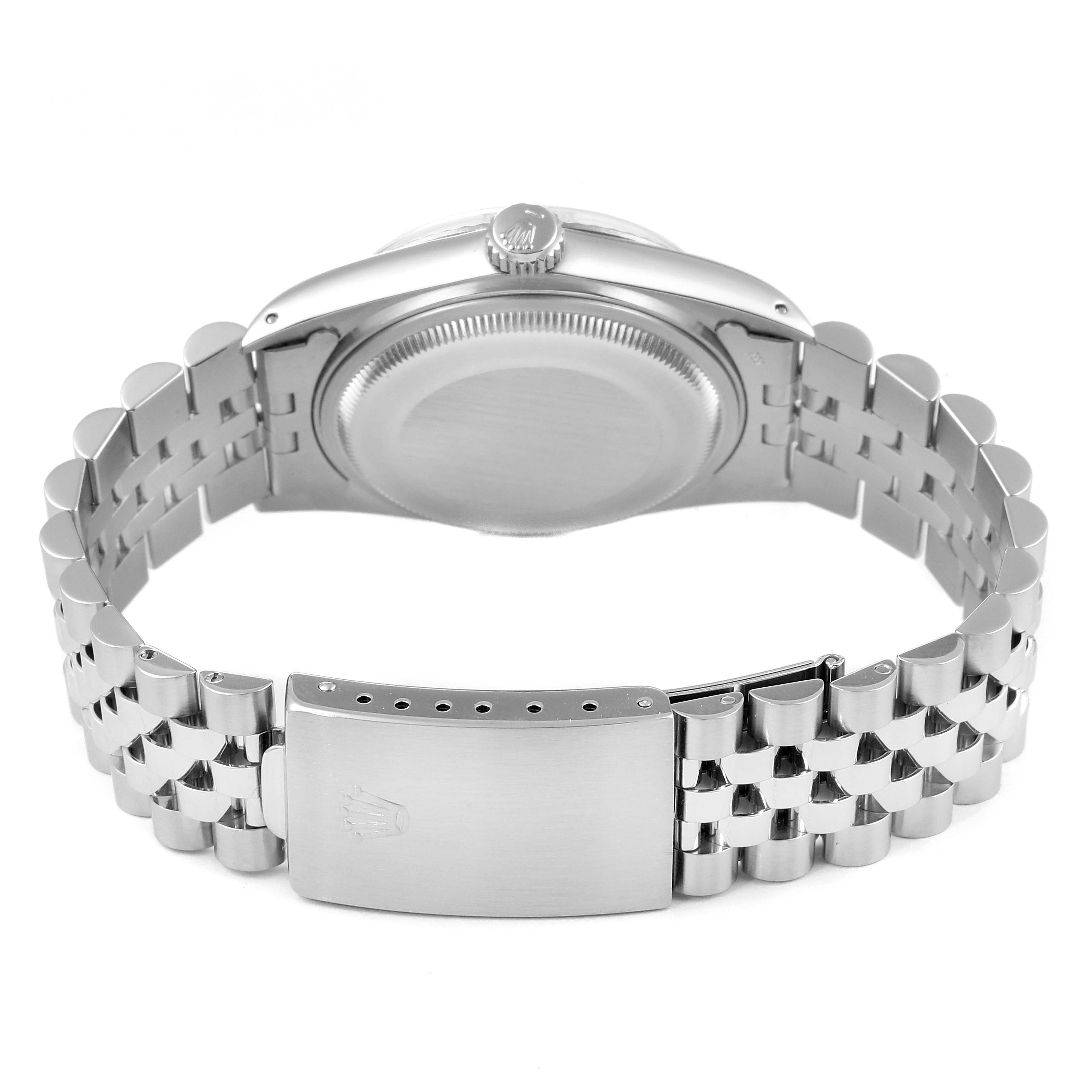 This image shows the back case and stainless steel bracelet with clasp of a Rolex Vintage Collection 16014 Men's Stainless Steel Silver Dial 16014 Men's Stainless Steel Silver Dial watch, rear view.