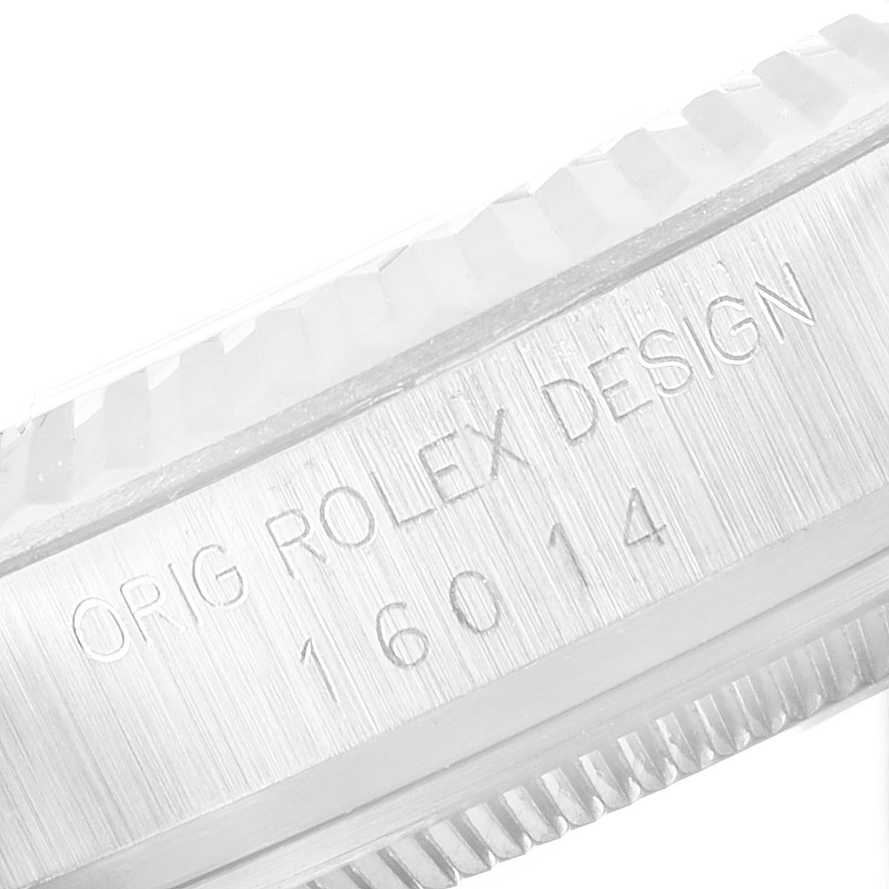 This image shows a close-up of the side of a Vintage Collection Rolex watch with the model number 16014 engraved.