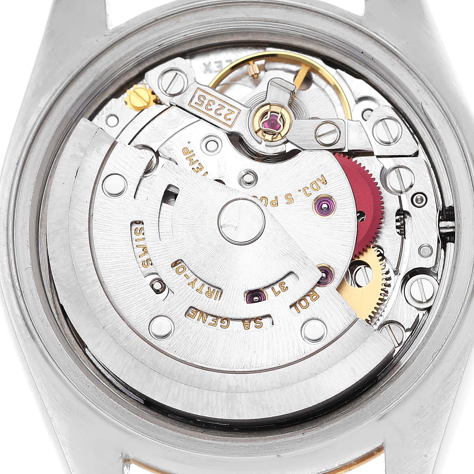 This image shows a close-up of the movement mechanism inside a Rolex Datejust 79173G Women's Steel and Gold (two tone) Champagne Dial 79173G Women's Steel and Gold (two tone) Champagne Dial watch.