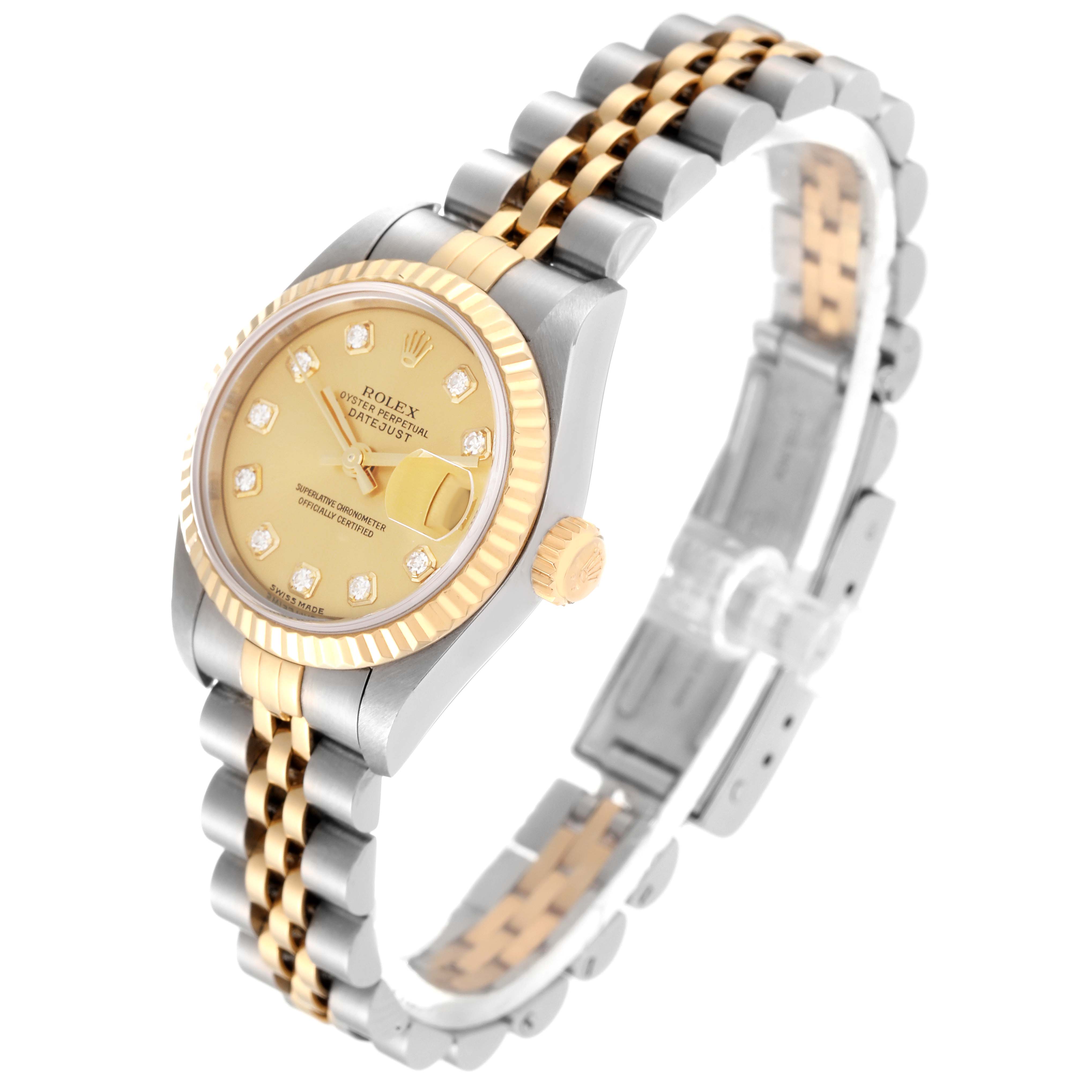This image shows a Rolex Datejust 79173G Women's Steel and Gold (two tone) Champagne Dial 79173G Women's Steel and Gold (two tone) Champagne Dial watch at a slight angle, displaying its face, case, crown, and two-tone bracelet.
