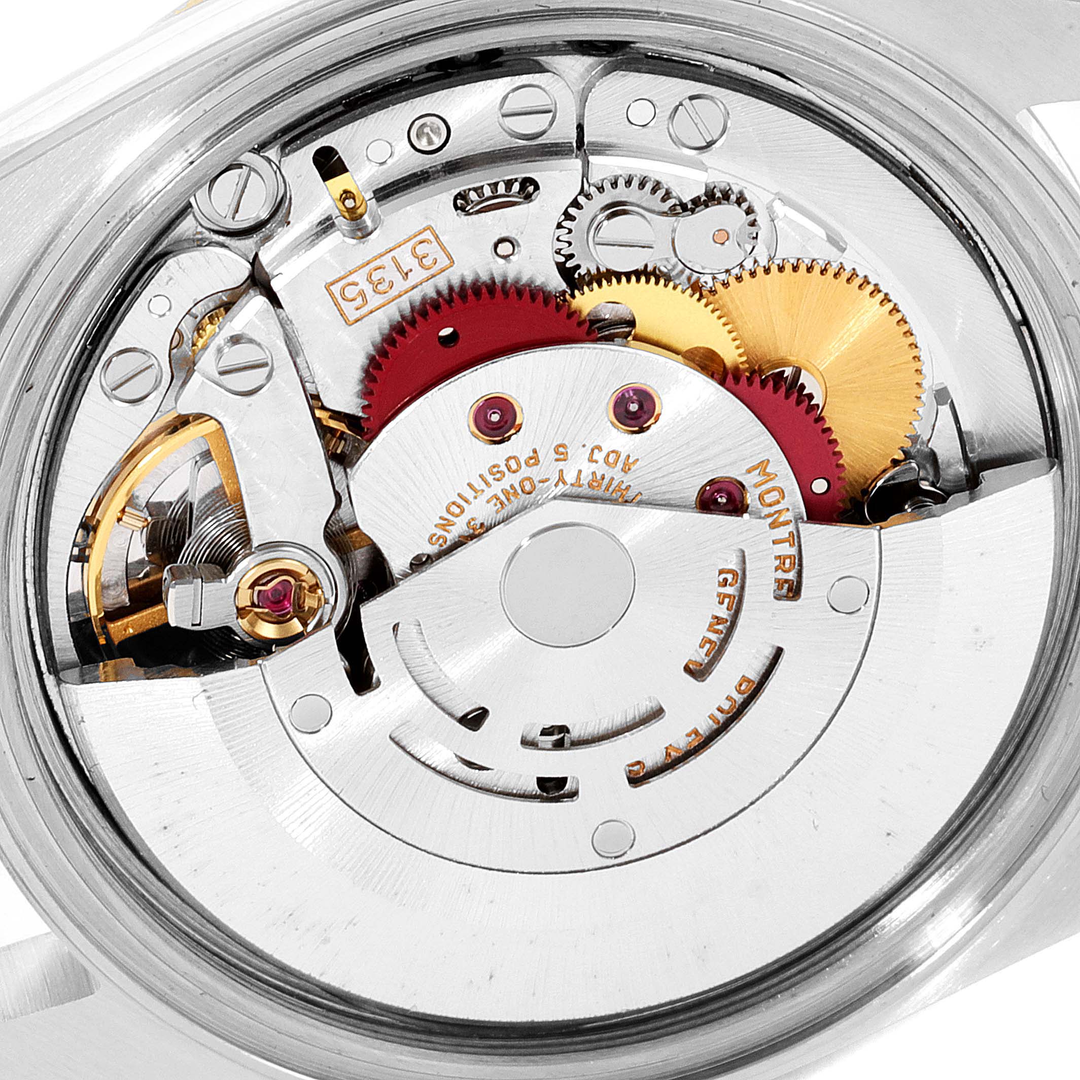 This image shows a close-up view of the movement mechanism inside a Rolex Datejust 16233 Men's Steel and Gold (two tone) Champagne Dial 16233 Men's Steel and Gold (two tone) Champagne Dial watch, highlighting its gears and components.