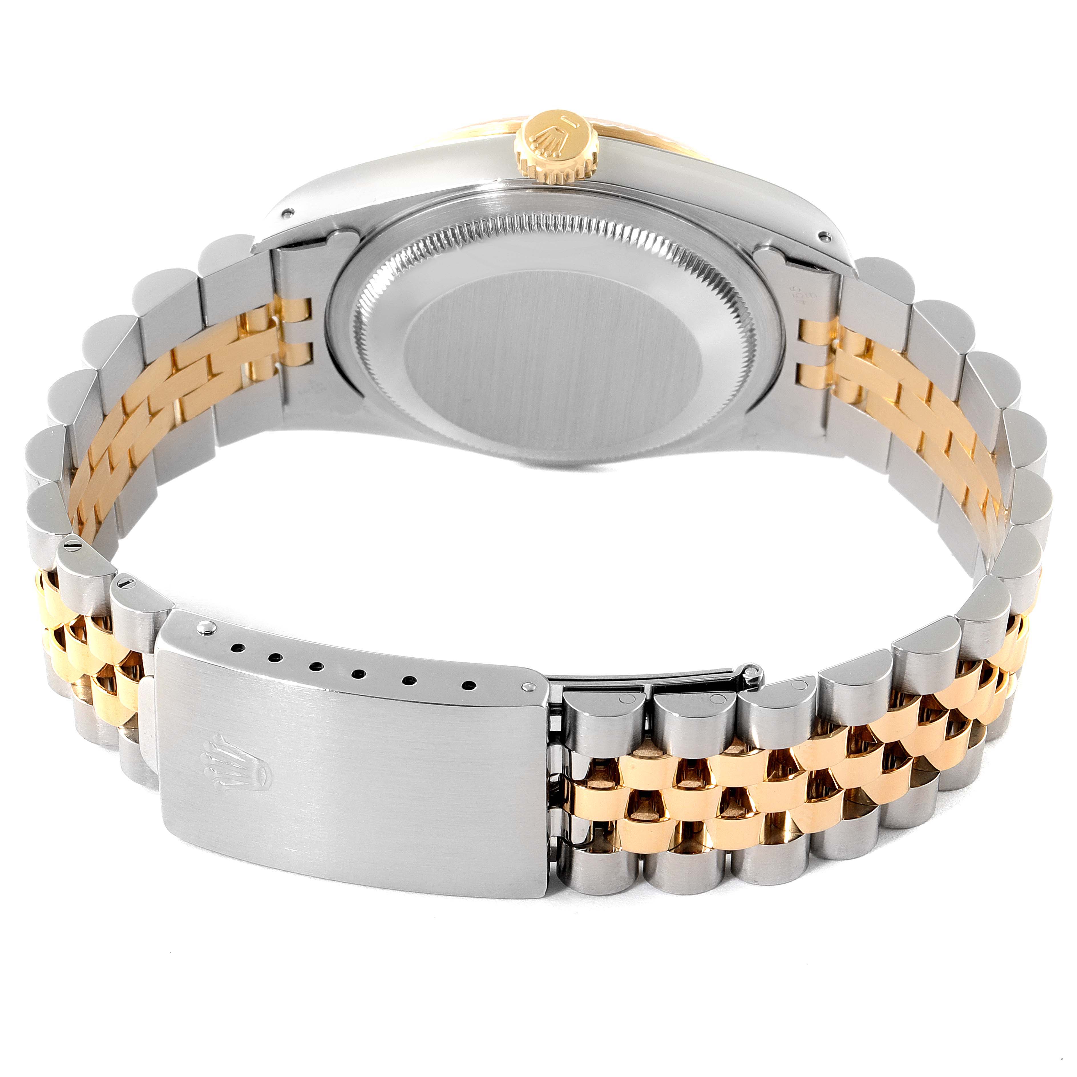 This Rolex Datejust 16233 Men's Steel and Gold (two tone) Champagne Dial 16233 Men's Steel and Gold (two tone) Champagne Dial watch is shown from the back, highlighting the clasp, bracelet, and case back.