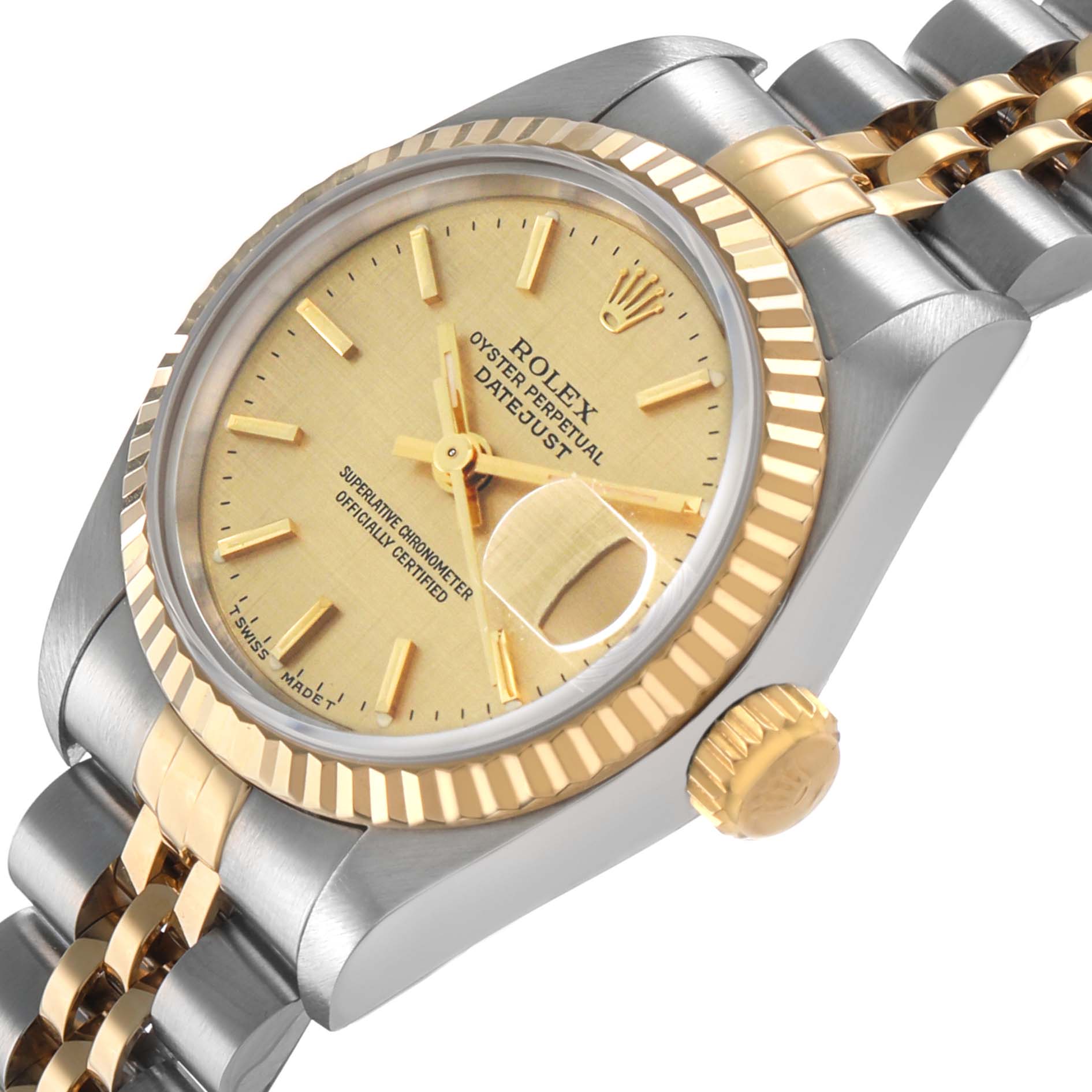 The Rolex Datejust 69173 Women's Steel and Gold (two tone) Champagne Dial watch is shown at an angled view, highlighting the dial, fluted bezel, crown, and a portion of the bracelet.