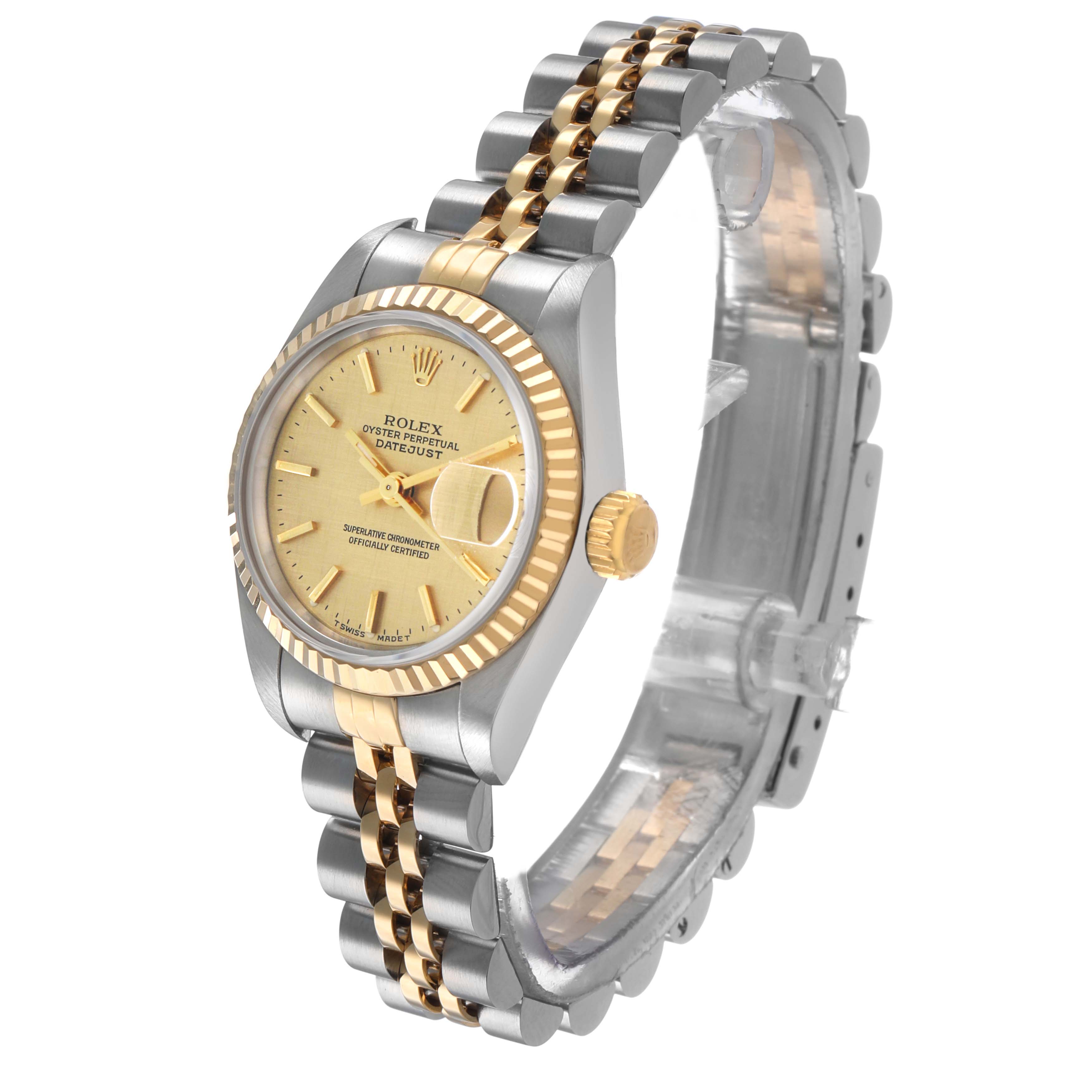 The Rolex Datejust 69173 Women's Steel and Gold (two tone) Champagne Dial watch is shown at an angled side view, displaying the face, bezel, crown, and bracelet.