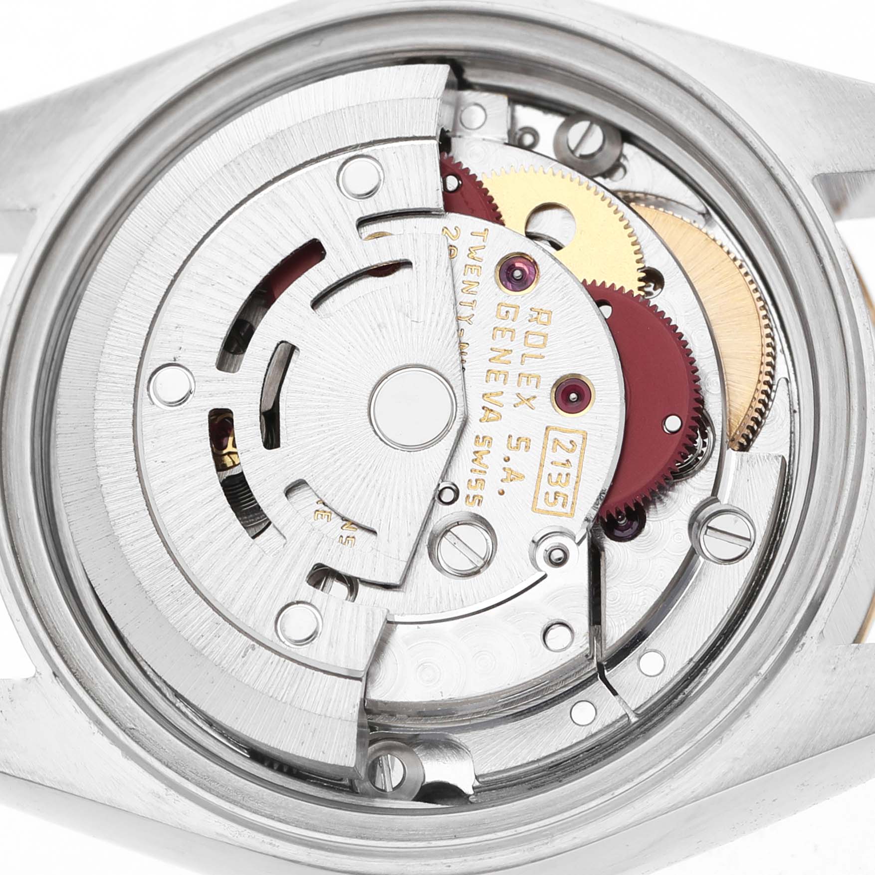The image shows the movement internals of a Rolex Datejust 69173 Women's Steel and Gold (two tone) Champagne Dial, highlighting its gears and rotor from a top angle.