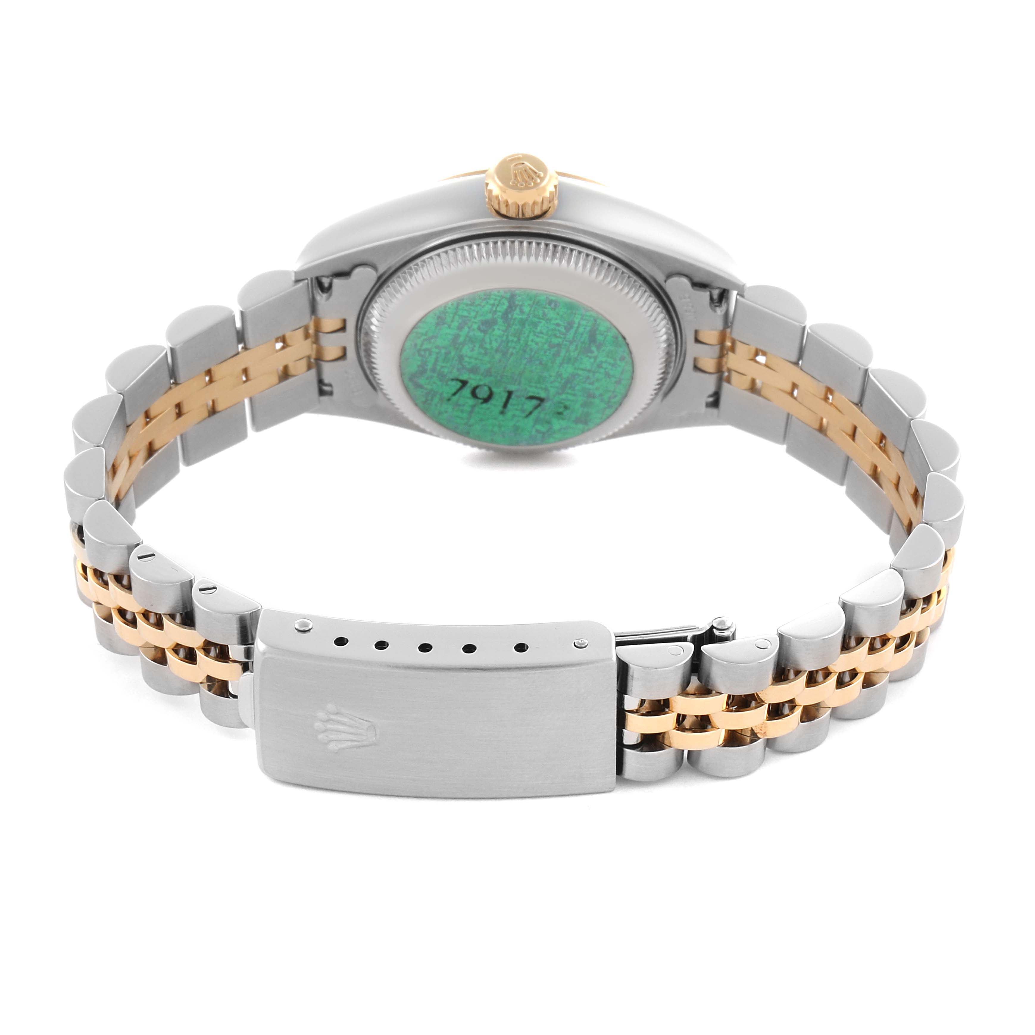 The image shows the back view of a Rolex Datejust 79173 Women's Steel and Gold (two tone) Champagne Dial 79173 Women's Steel and Gold (two tone) Champagne Dial, highlighting the case back, crown, and bracelet with a two-tone design.