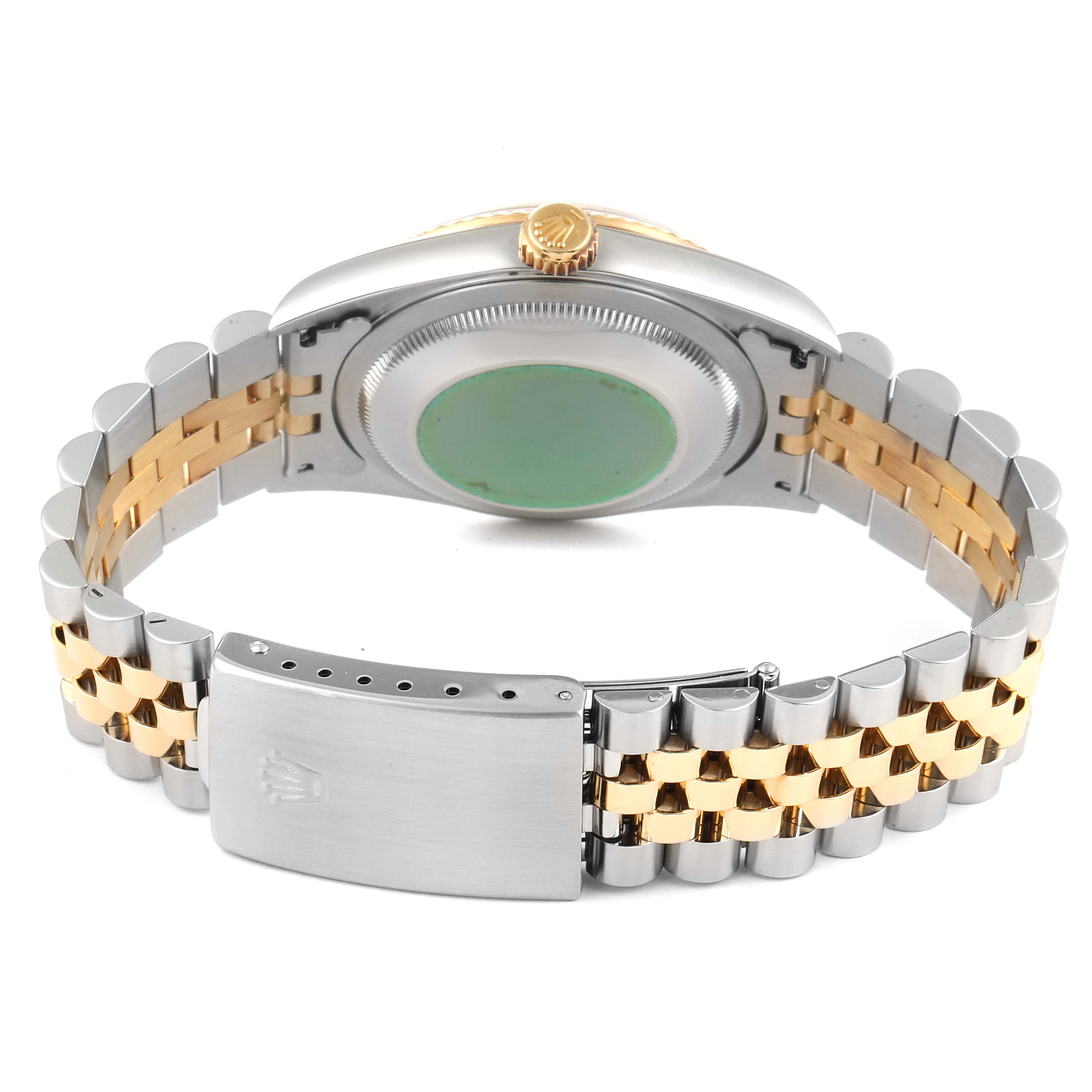 The image shows the back view of the Rolex Datejust 16233 Men's Steel and Gold (two tone) Silver Dial 16233 Men's Steel and Gold (two tone) Silver Dial watch with its Jubilee bracelet and closed clasp.