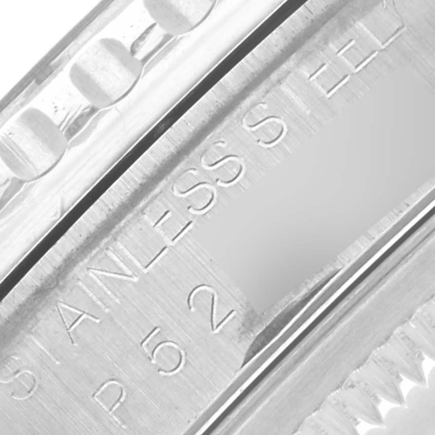 The image shows a close-up of the bezel and engraved text on the Rolex Turn-o-Graph 16264 Men's Stainless Steel Black Dial 16264 Men's Stainless Steel Black Dial watch, highlighting "STAINLESS STEEL."