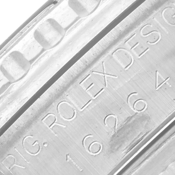 The image shows a close-up of the engraved side of a Rolex Turn-o-Graph 16264 Men's Stainless Steel Black Dial 16264 Men's Stainless Steel Black Dial watch, focusing on the model number and branding.