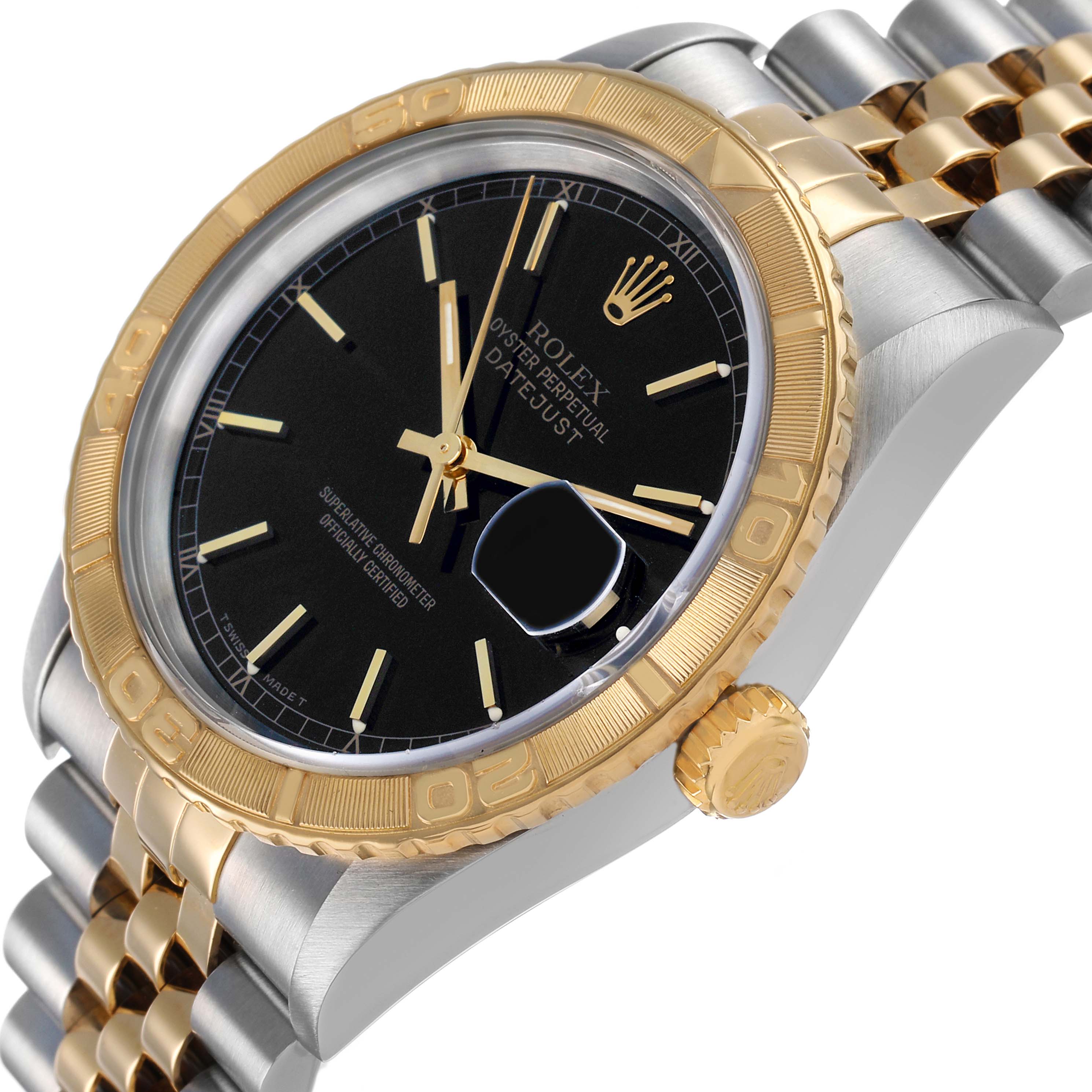 The Rolex Turn-o-Graph 16263 Men's Steel and Gold (two tone) Black Dial watch is shown at an angled side view, highlighting the gold bezel, crown, and steel-gold bracelet.