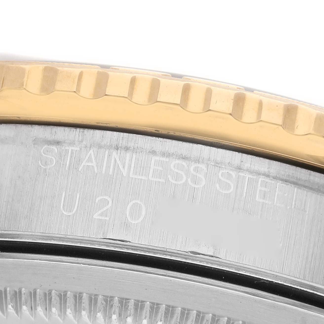The image shows a close-up of the bezel and side of a Rolex Turn-o-Graph 16263 Men's Steel and Gold (two tone) Black Dial watch, highlighting the stainless steel and gold finish.
