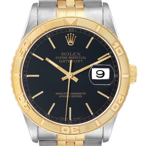 The Rolex Turn-o-Graph 16263 Men's Steel and Gold (two tone) Black Dial watch is shown from the front, highlighting its black dial, gold bezel, and two-tone bracelet.