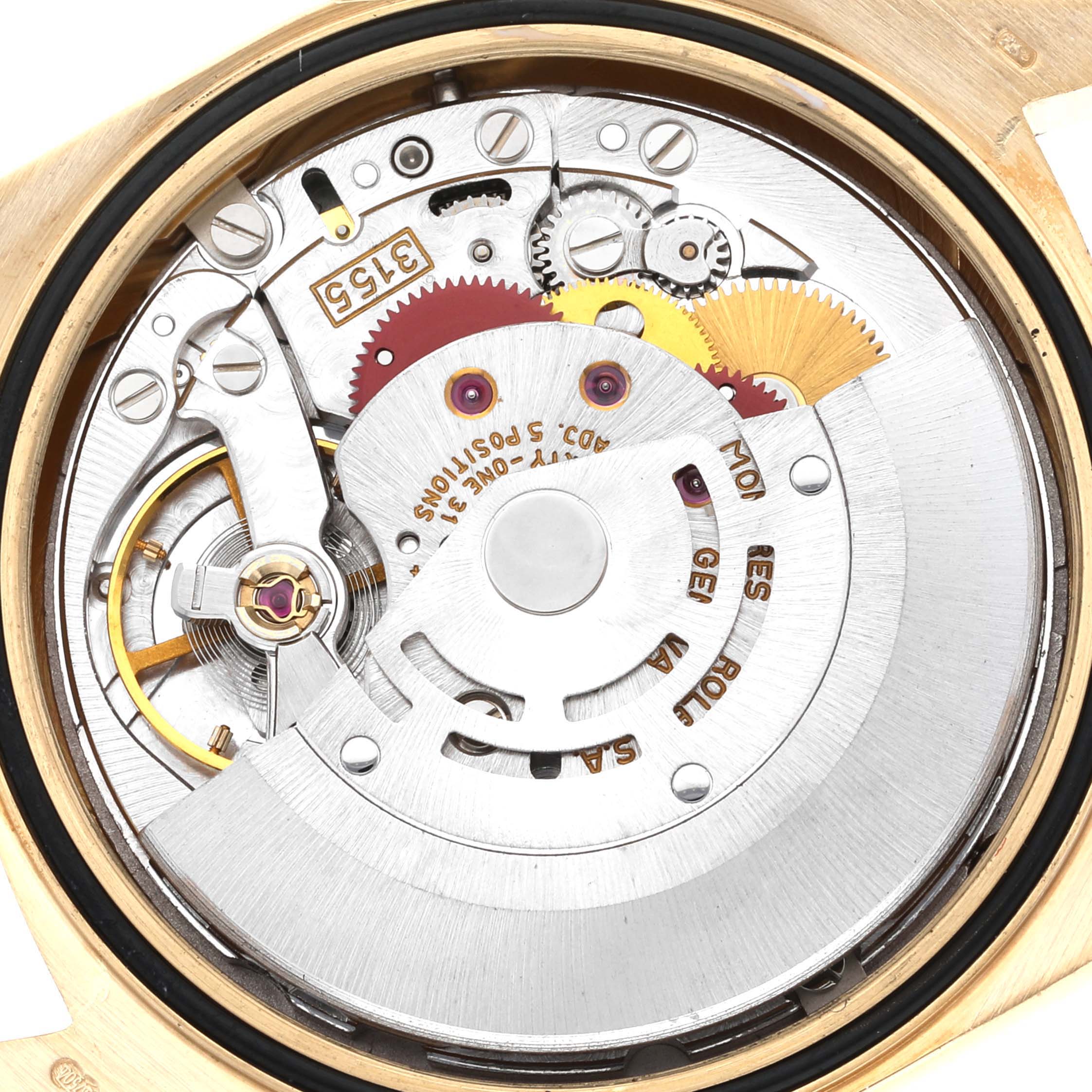 This image shows the intricate internal mechanism and movement of the Rolex President 18248 Men's Yellow Gold Champagne Dial 18248 Men's Yellow Gold Champagne Dial model watch from a back angle.