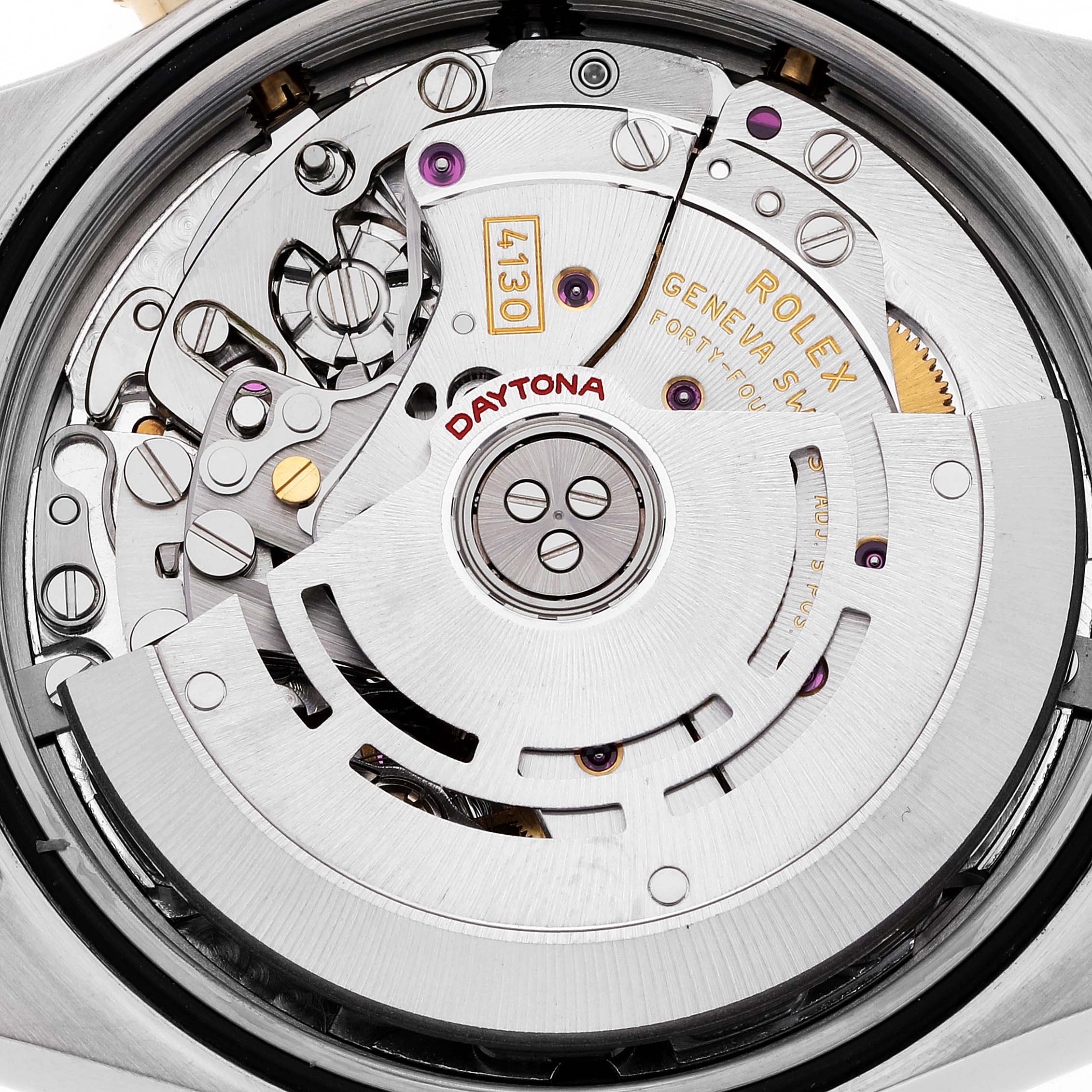 This image shows the inner mechanical movement of a Rolex Daytona 116523 Men's Steel and Gold (two tone) Mother of Pearl Dial 116523 Men's Steel and Gold (two tone) Mother of Pearl Dial watch, showcasing the intricate parts and engravings.