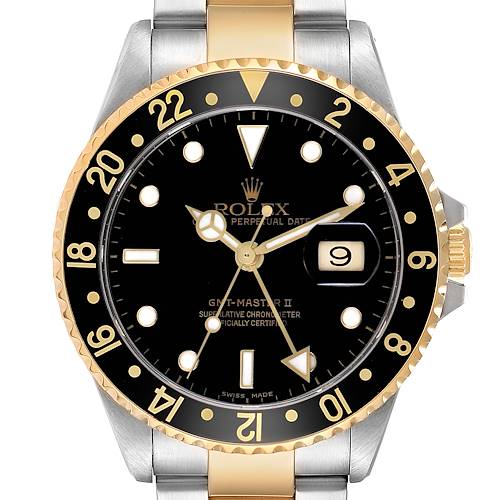 The image shows a frontal view of a Rolex GMT-Master 16713 Men's Steel and Gold (two tone) Black Dial II watch, highlighting the bezel, dial, hands, and bracelet.
