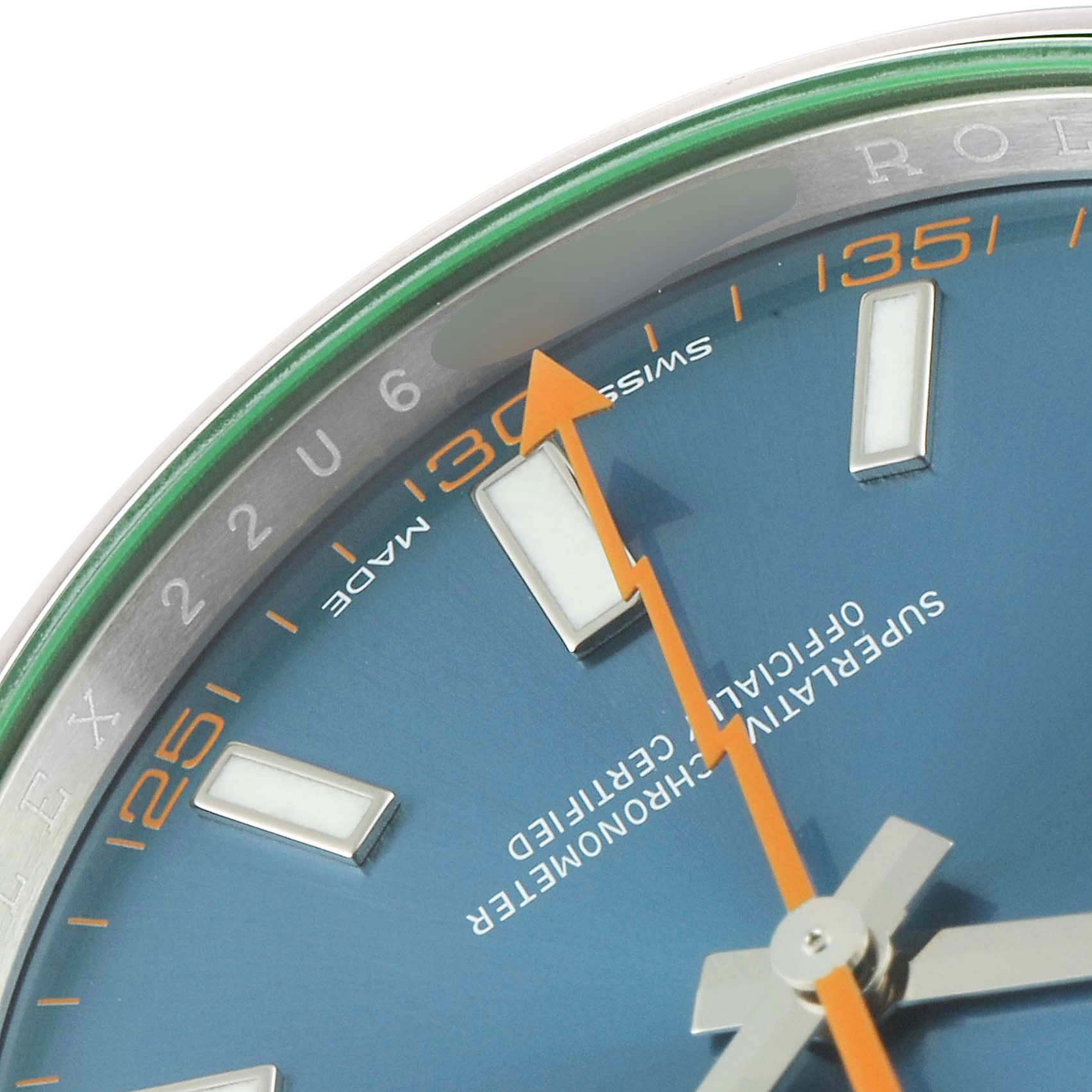The image shows a close-up of the dial, hour markers, and second hand of a Rolex Milgauss 116400GV Men's Stainless Steel Blue Dial 116400GV Men's Stainless Steel Blue Dial watch.