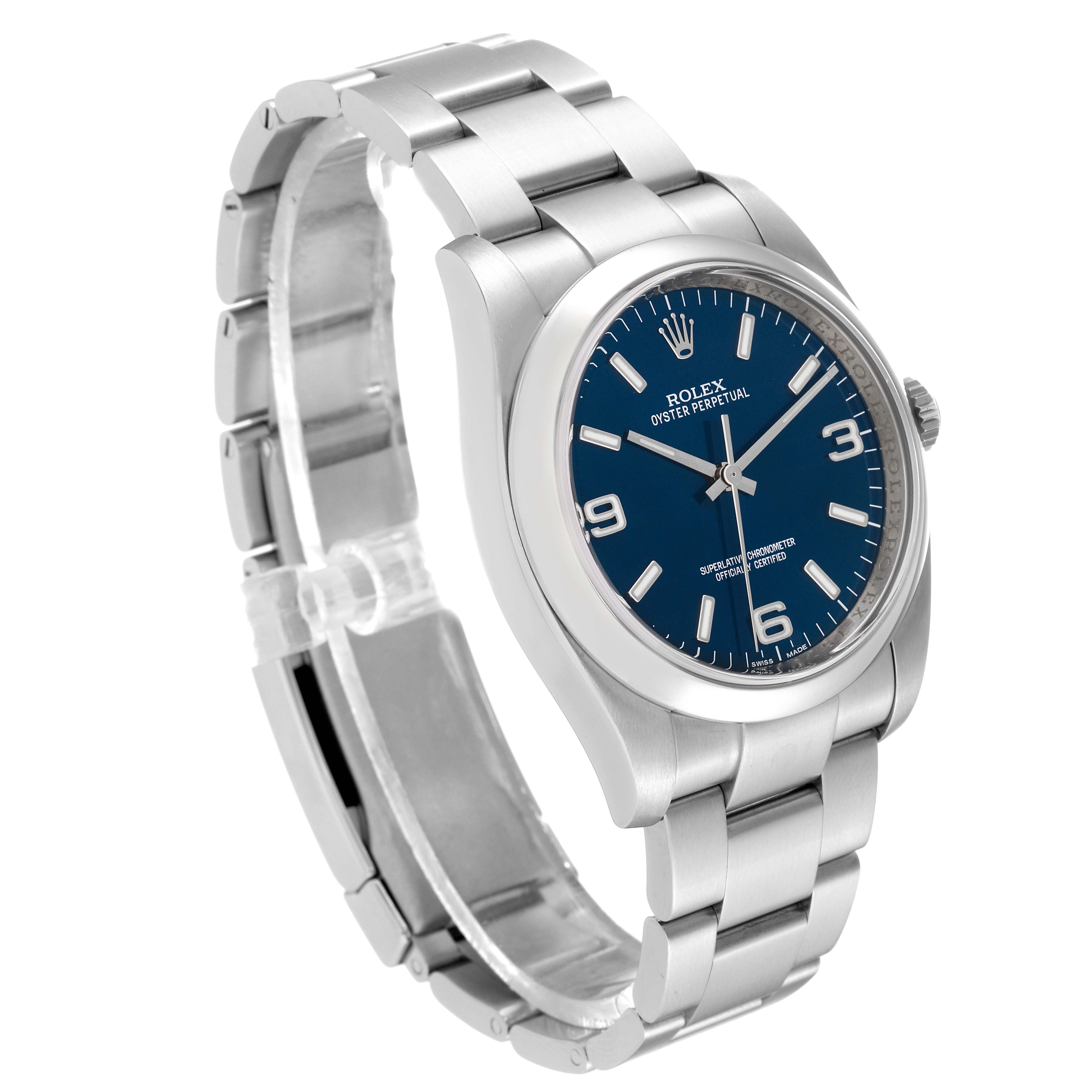 The image shows a Rolex Oyster Perpetual 116000 Men
s Stainless Steel Blue Dial 116000 Men
s Stainless Steel Blue Dial watch at a three-quarter angle, highlighting the bracelet, case, and blue dial.