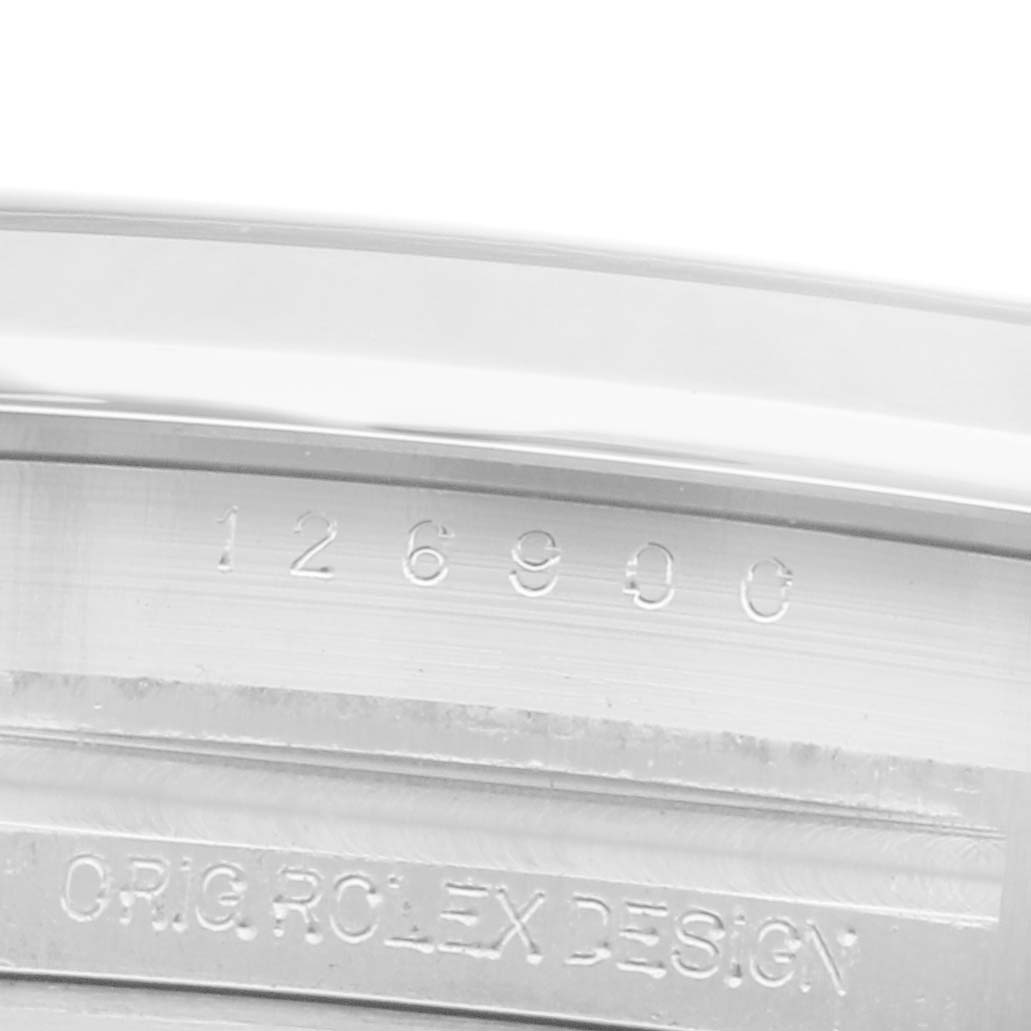 The image shows the inner engraving on the bezel of a Rolex Air-King 126900 Men's Stainless Steel Black Dial 126900 Men's Stainless Steel Black Dial, displaying its model number and design engraving.