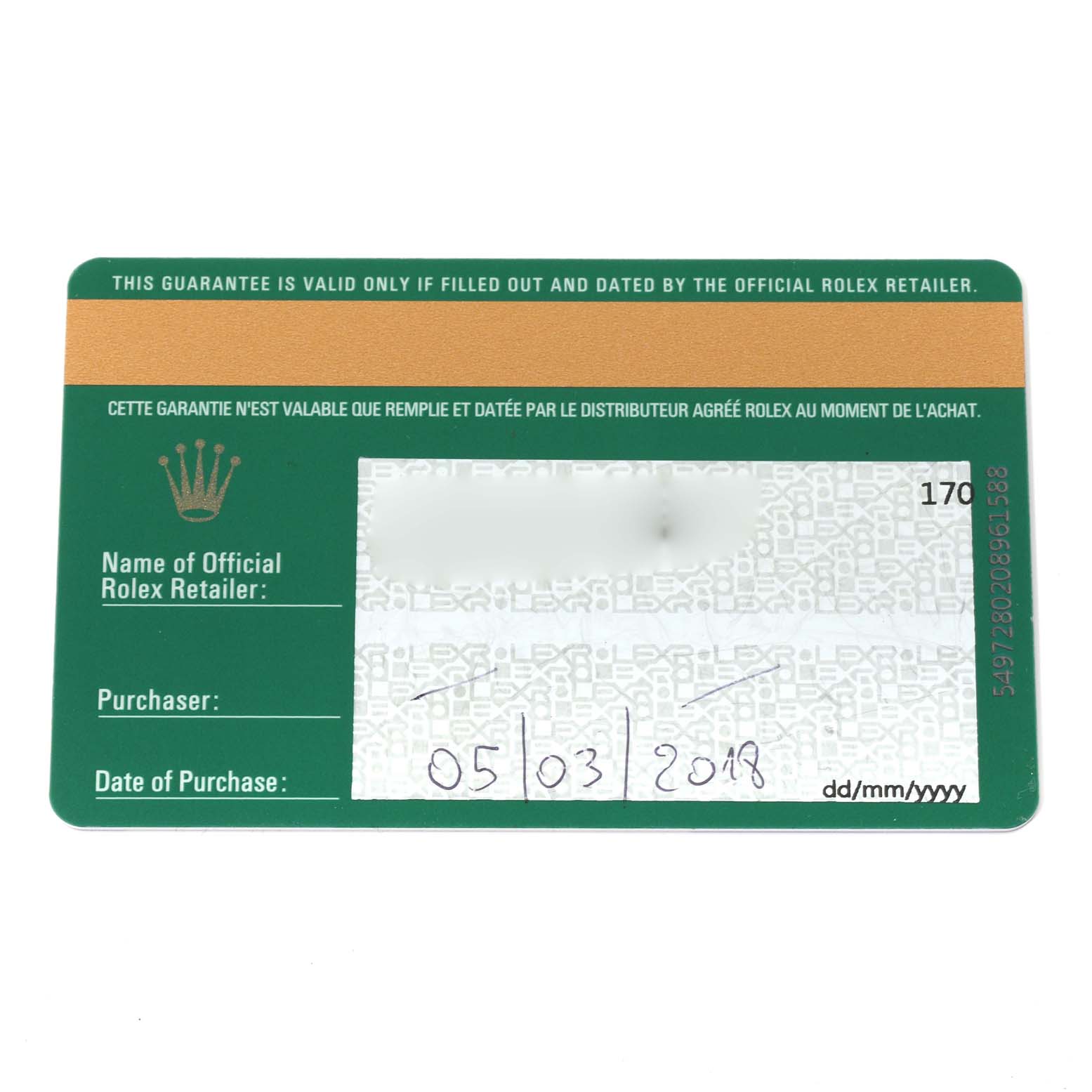 This image shows the guarantee card for the Mid-Size Rolex watch taken from a top view.