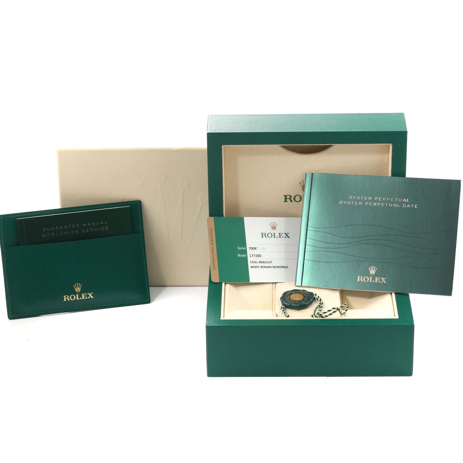 The image shows the packaging, manuals, warranty card, and accessories for a Rolex Mid-Size 177200 Women
s Stainless Steel White Dial 177200 Women
s Stainless Steel White Dial watch.