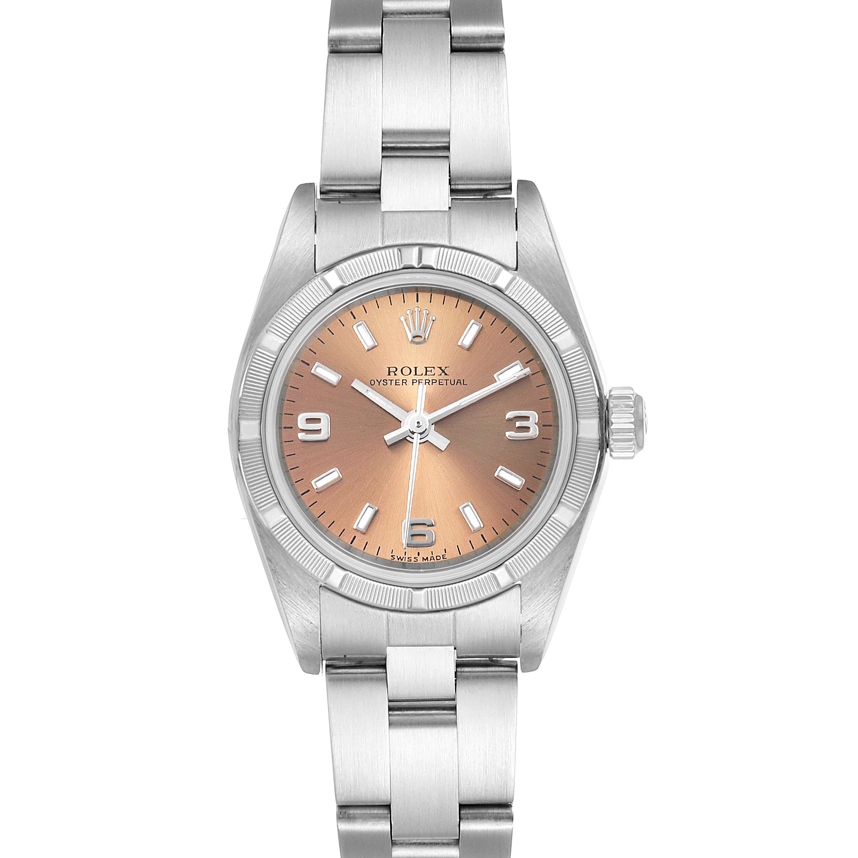 The image shows a front view of a Rolex Oyster Perpetual 76030 Women's Stainless Steel Pink Dial 76030 Women's Stainless Steel Pink Dial watch with a silver bracelet and a salmon-colored dial.