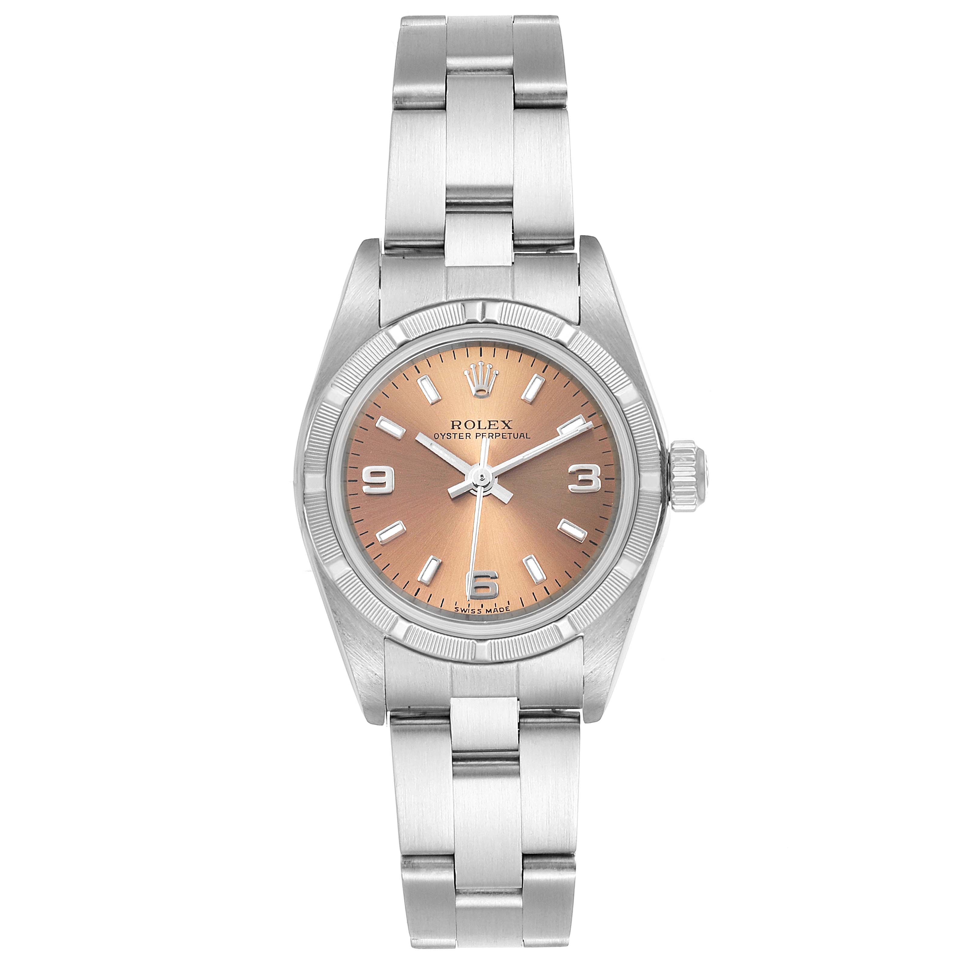The image displays a front view of a Rolex Oyster Perpetual 76030 Women's Stainless Steel Pink Dial 76030 Women's Stainless Steel Pink Dial watch showing its face, bezel, bracelet, and crown.